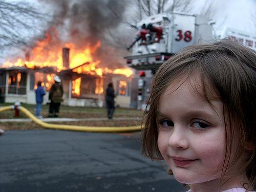 Buzzfeed-Buzzfeed-disaster-girl-in-front-of-a-burning-house-.jpg