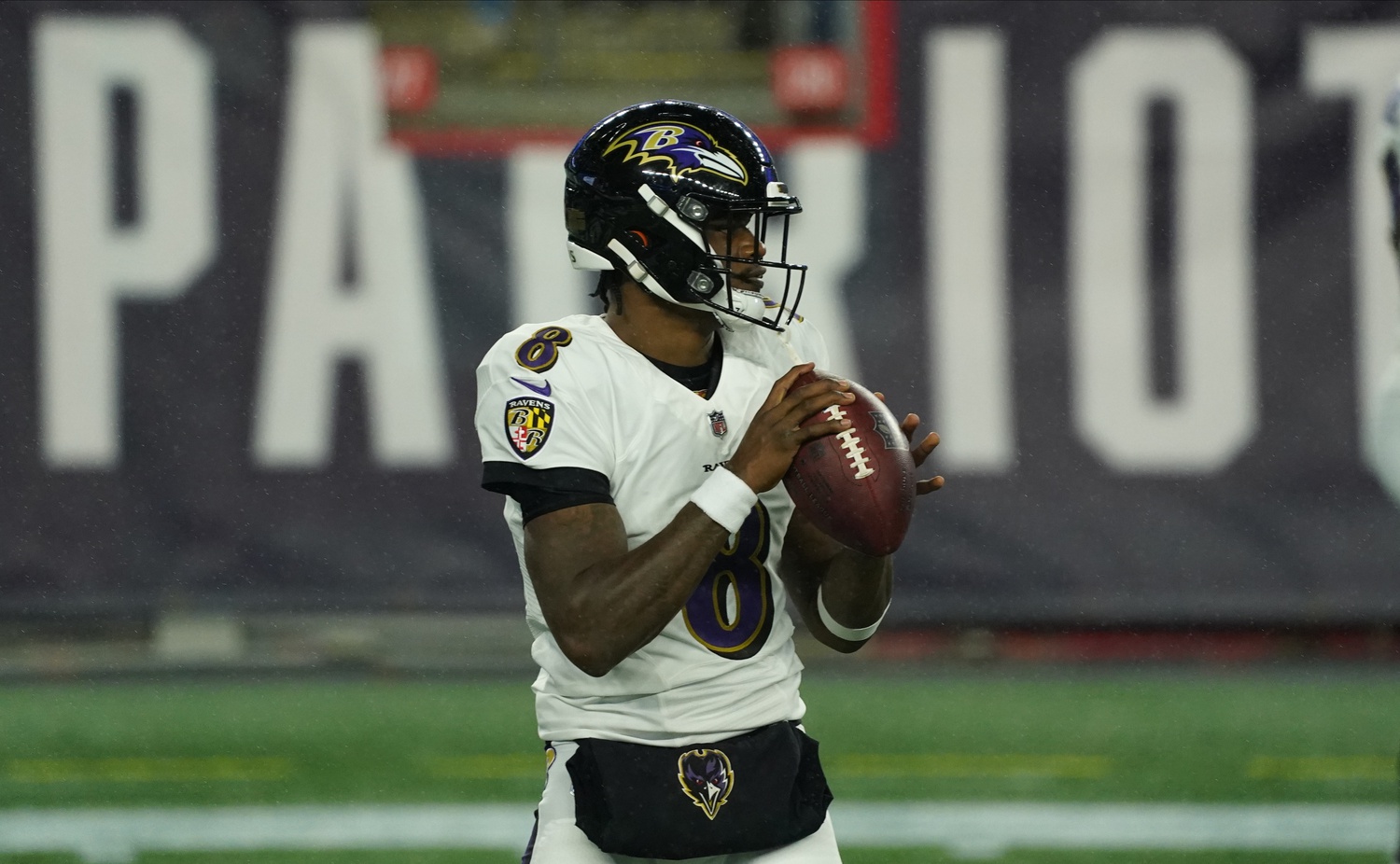 Nov 15, 2020; Foxborough, Massachusetts, USA; Baltimore Ravens quarterback Lamar Jackson (8) warms up before the start of the game against the New England Patriots at Gillette Stadium. Mandatory Credit: David Butler II-USA TODAY Sports