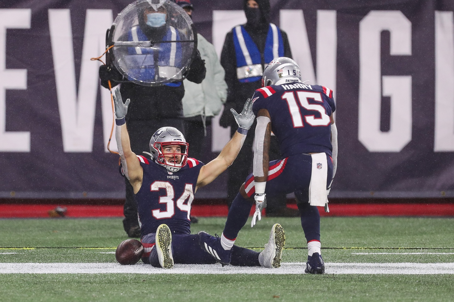 Nov 15, 2020; Foxborough, Massachusetts, USA; New England Patriots running back Rex Burkhead (34) celebrates after scoring a touchdown during the first half against the Baltimore Ravens at Gillette Stadium. Mandatory Credit: Paul Rutherford-USA TODAY Sports