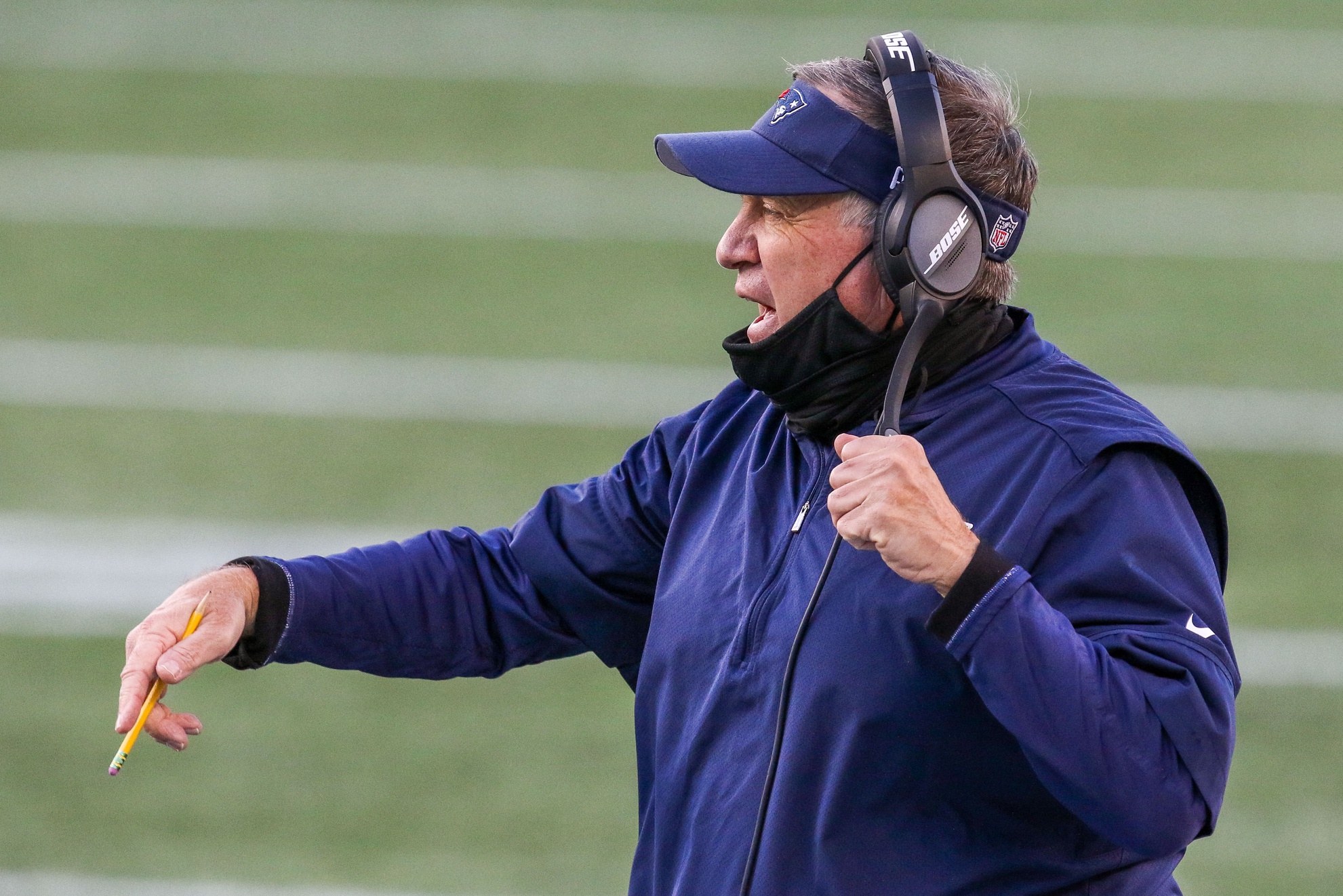 Nov 29, 2020; Foxborough, Massachusetts, USA; New England Patriots head coach Bill Belichick reacts against the Arizona Cardinals during the first half at Gillette Stadium. Mandatory Credit: Paul Rutherford-USA TODAY Sports