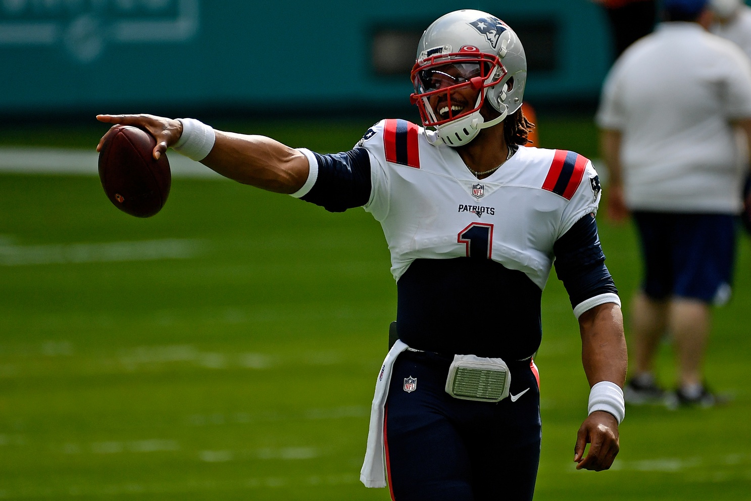 Dec 20, 2020; Miami Gardens, Florida, USA; New England Patriots quarterback Cam Newton (1) warms up prior to the game against the Miami Dolphins at Hard Rock Stadium. Mandatory Credit: Jasen Vinlove-USA TODAY Sports