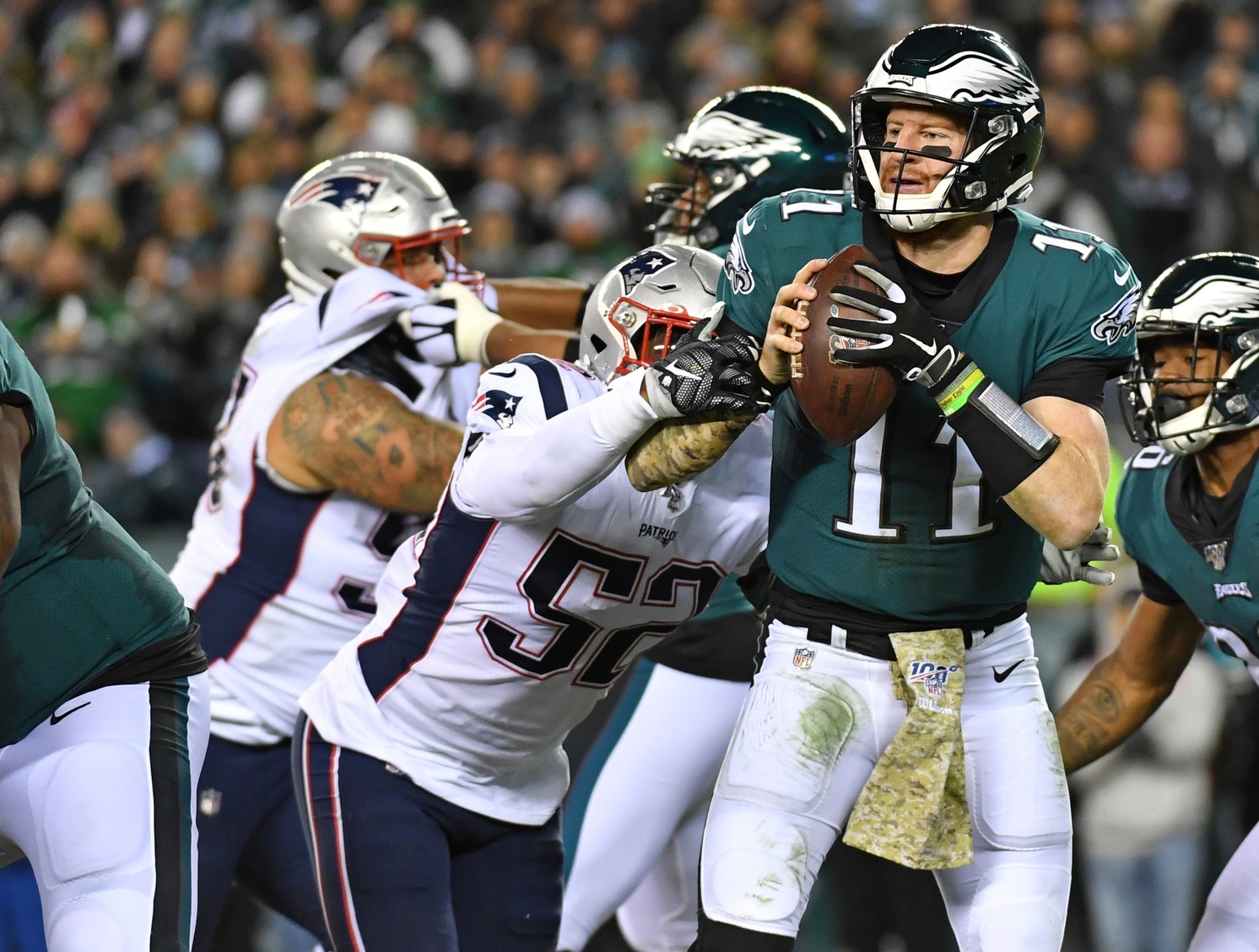 Nov 17, 2019; Philadelphia, PA, USA; New England Patriots outside linebacker Elandon Roberts (52) sacks Philadelphia Eagles quarterback Carson Wentz (11) during the second quarter at Lincoln Financial Field. Mandatory Credit: Eric Hartline-USA TODAY Sports