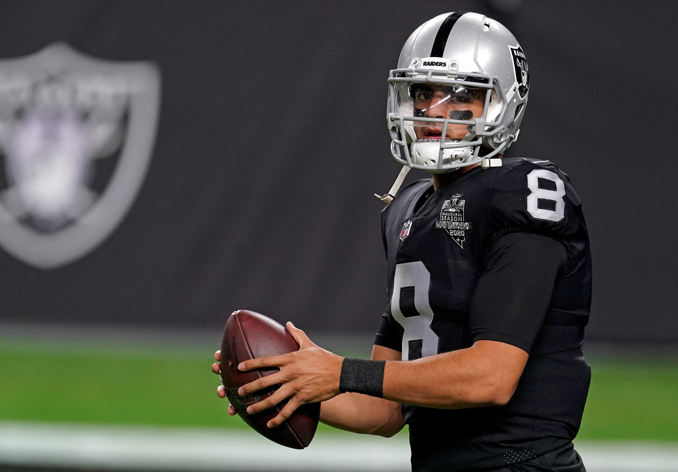Dec 26, 2020; Paradise, Nevada, USA; Las Vegas Raiders quarterback Marcus Mariota (8) warms up before a game against the Miami Dolphins at Allegiant Stadium. Mandatory Credit: Kirby Lee-USA TODAY Sports