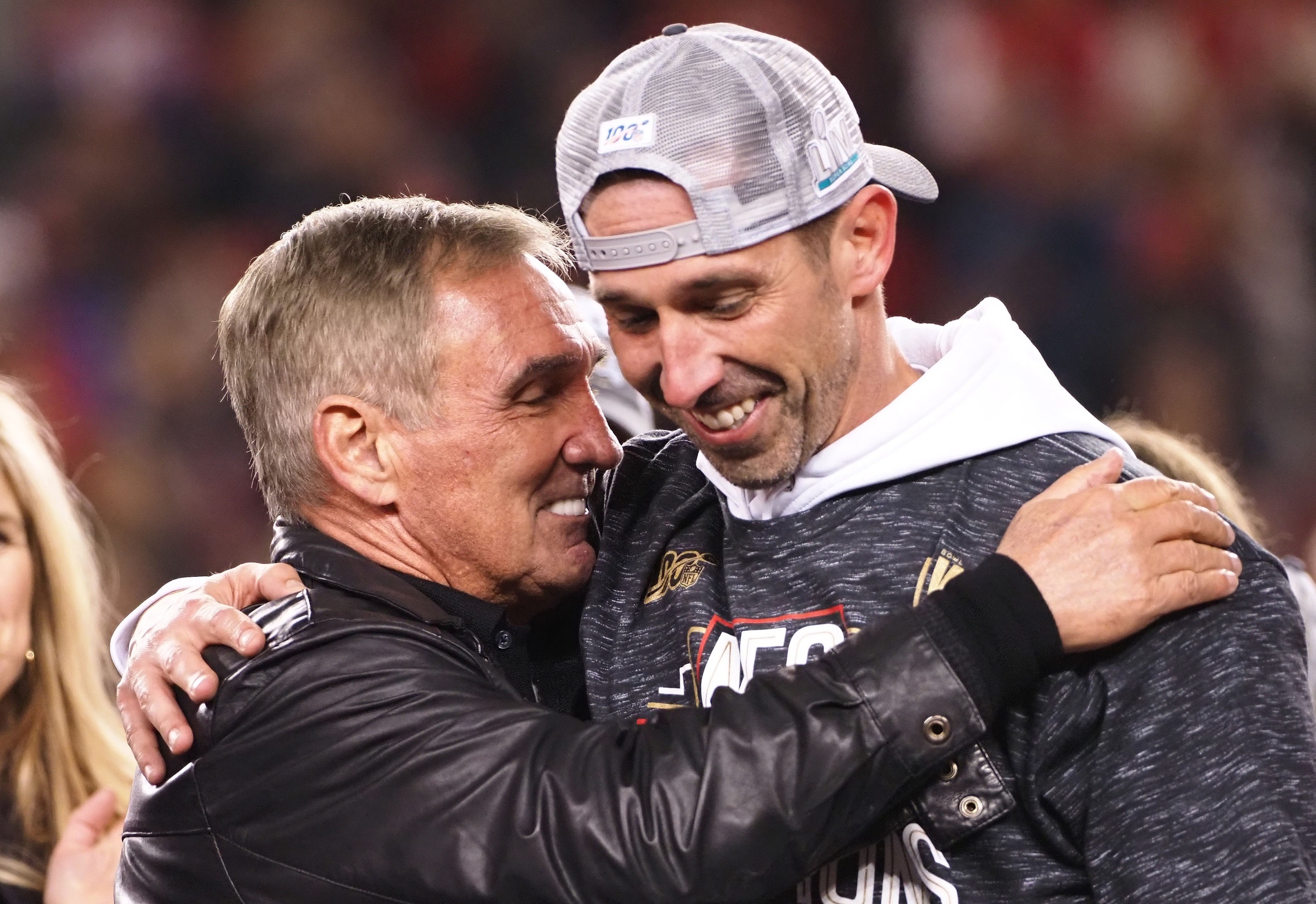 Jan 19, 2020; Santa Clara, California, USA; San Francisco 49ers head coach Kyle Shanahan celebrates the 37-20 victory against the Green Bay Packers  with his father Mike Shanahan in the NFC Championship Game at Levi's Stadium. Mandatory Credit: Kelley L Cox-USA TODAY Sports