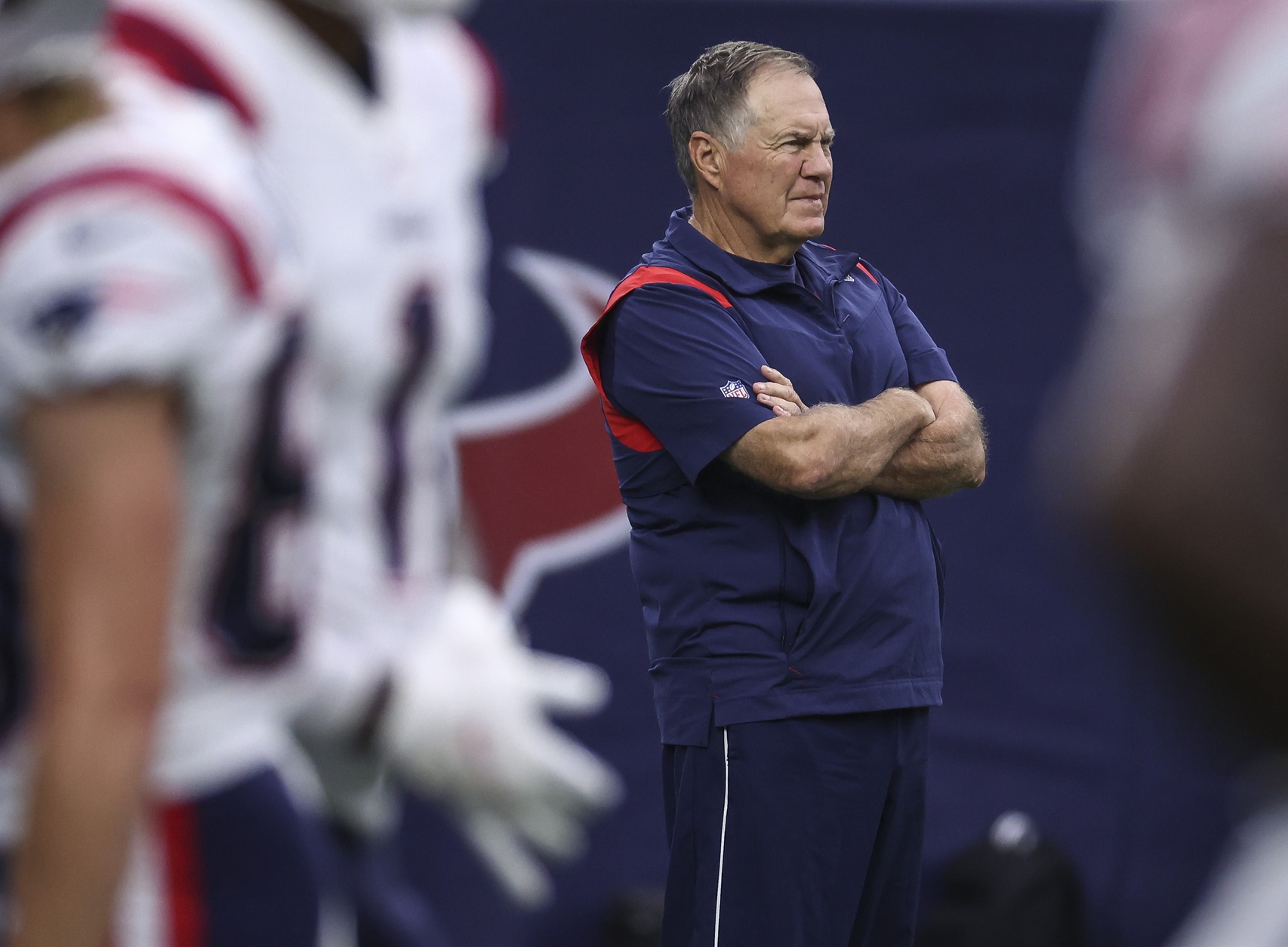 Oct 10, 2021; Houston, Texas, USA; New England Patriots head coach Bill Belichick watches warmups before the game against the Houston Texans at NRG Stadium. Mandatory Credit: Troy Taormina-USA TODAY Sports