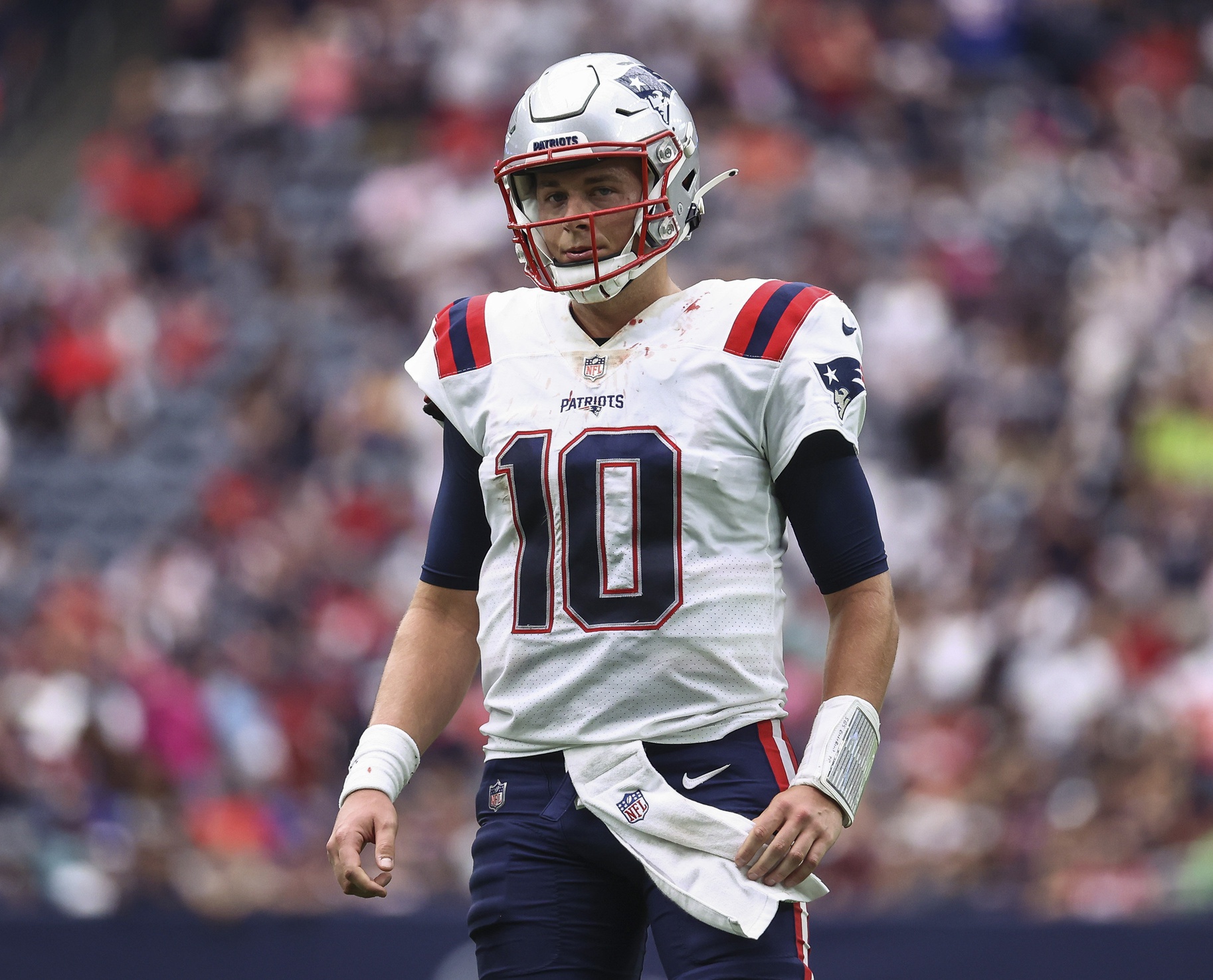 Oct 10, 2021; Houston, Texas, USA; New England Patriots quarterback Mac Jones (10) reacts during the fourth quarter against the Houston Texans at NRG Stadium. Mandatory Credit: Troy Taormina-USA TODAY Sports