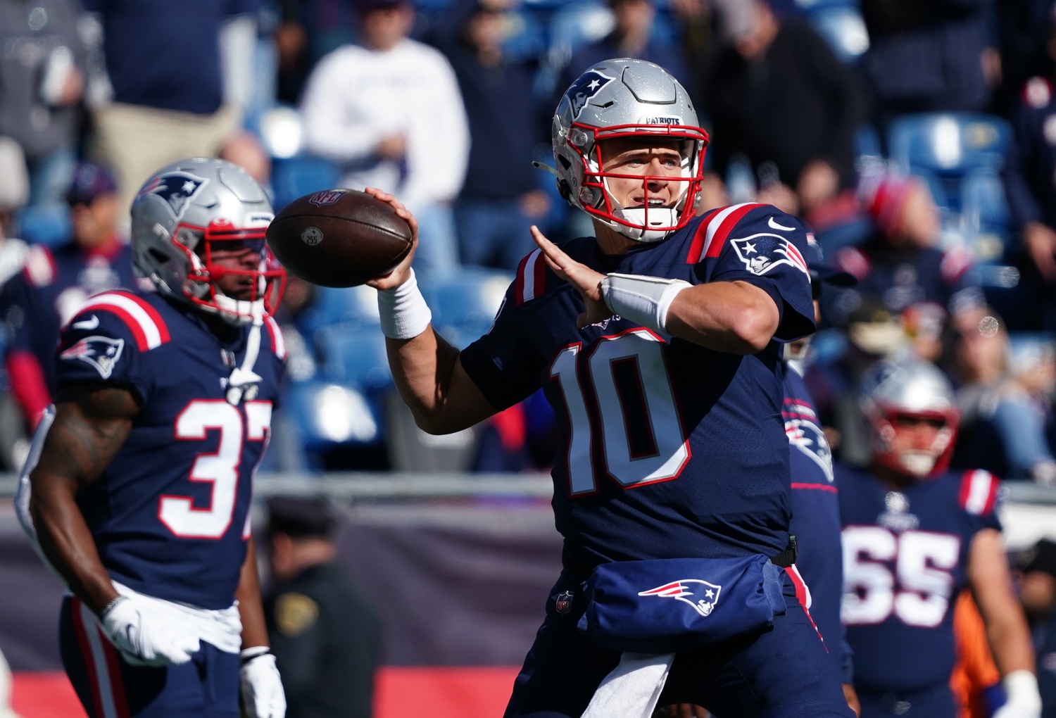 Oct 24, 2021; Foxborough, Massachusetts, USA; New England Patriots quarterback Mac Jones (10) warms up before the start of the game against the New York Jets at Gillette Stadium. Mandatory Credit: David Butler II-USA TODAY Sports