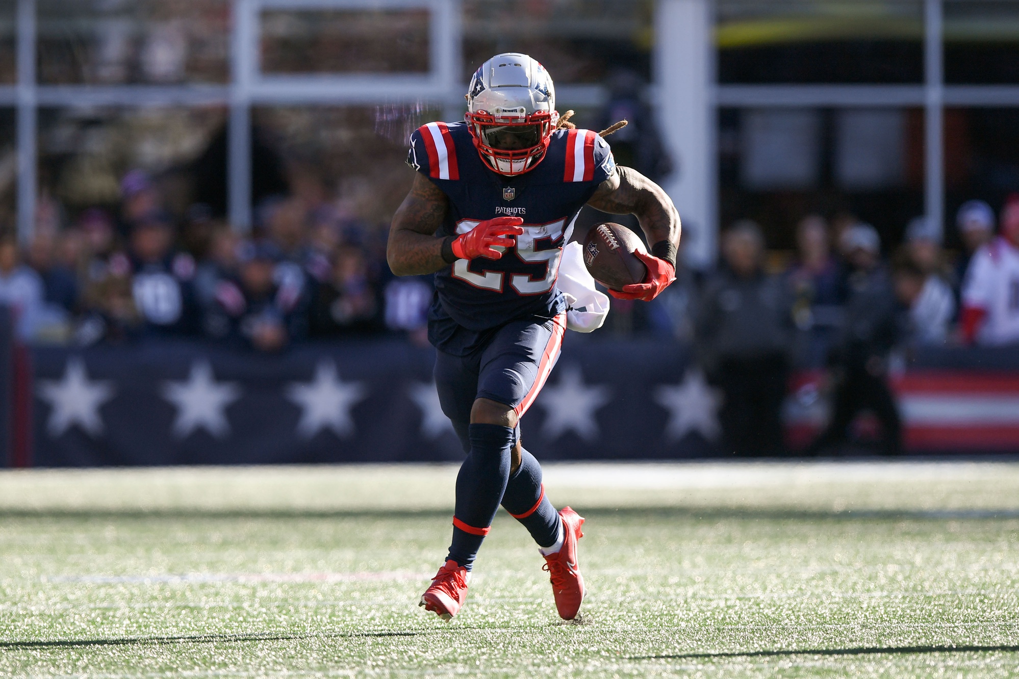 Oct 24, 2021; Foxborough, Massachusetts, USA; New England Patriots running back Brandon Bolden (25) runs with the ball against the New York Jets during the second half at Gillette Stadium. Mandatory Credit: Brian Fluharty-USA TODAY Sports