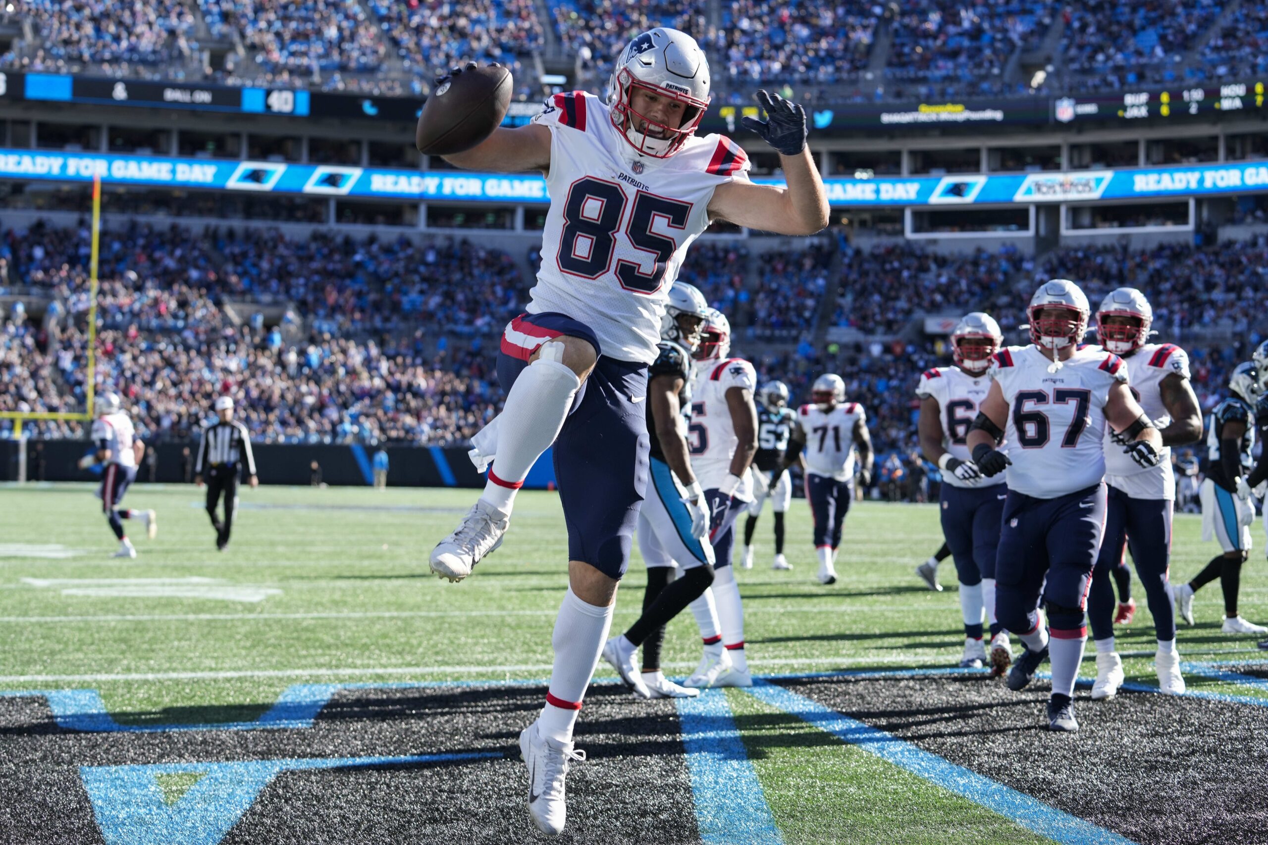 Nov 7, 2021; Charlotte, North Carolina, USA; New England Patriots tight end Hunter Henry (85) celebrates his touchdown during the second quarter against the Carolina Panthers at Bank of America Stadium. Mandatory Credit: Jim Dedmon-USA TODAY Sports
