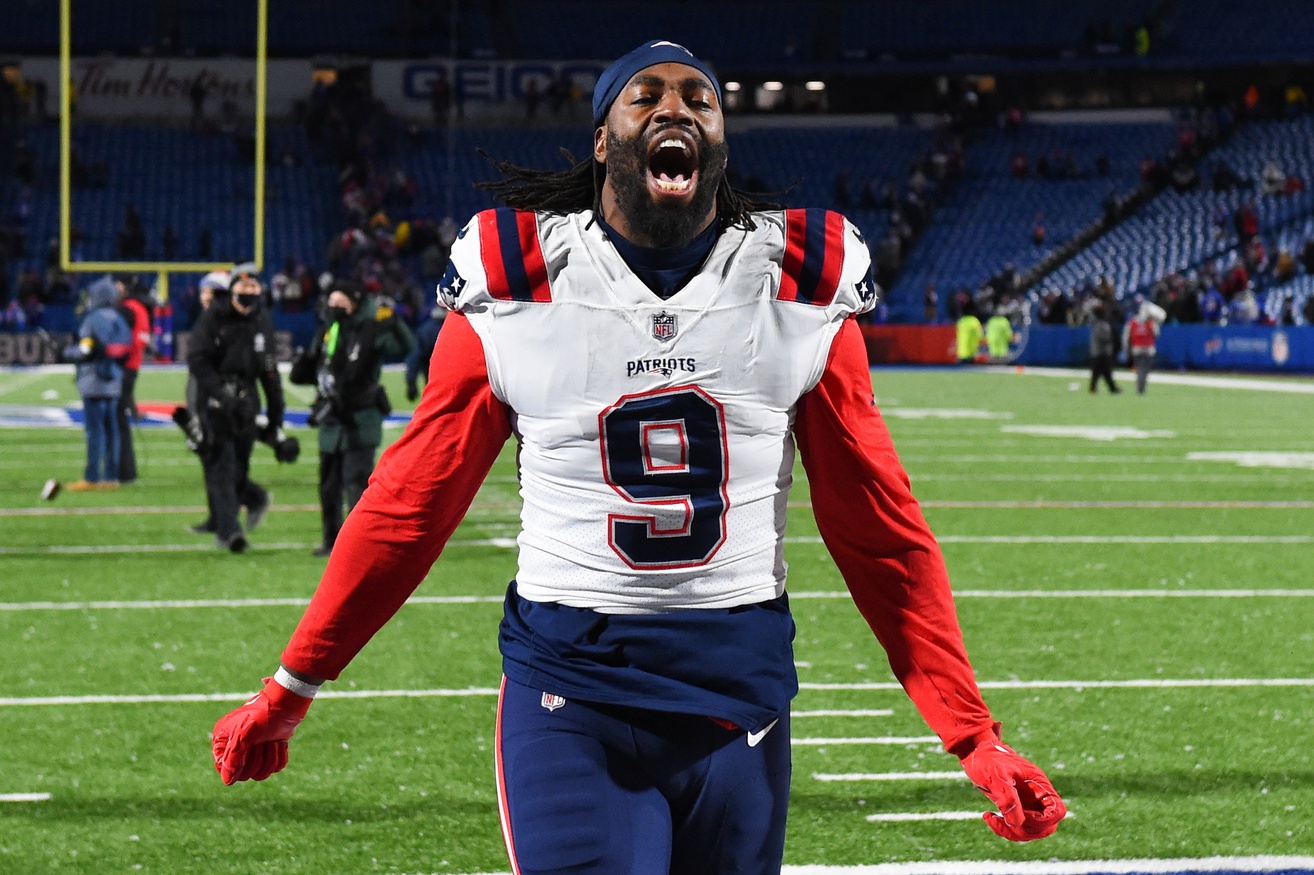 Dec 6, 2021; Orchard Park, New York, USA; New England Patriots outside linebacker Matt Judon (9) celebrates while leaving the field following the game against the Buffalo Bills at Highmark Stadium. Mandatory Credit: Rich Barnes-USA TODAY Sports