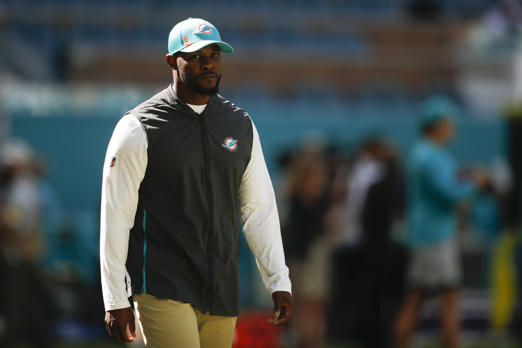 Nov 7, 2021; Miami Gardens, Florida, USA; Miami Dolphins head coach Brian Flores walks on the field prior the game against the Houston Texans at Hard Rock Stadium. Mandatory Credit: Sam Navarro-USA TODAY Sports