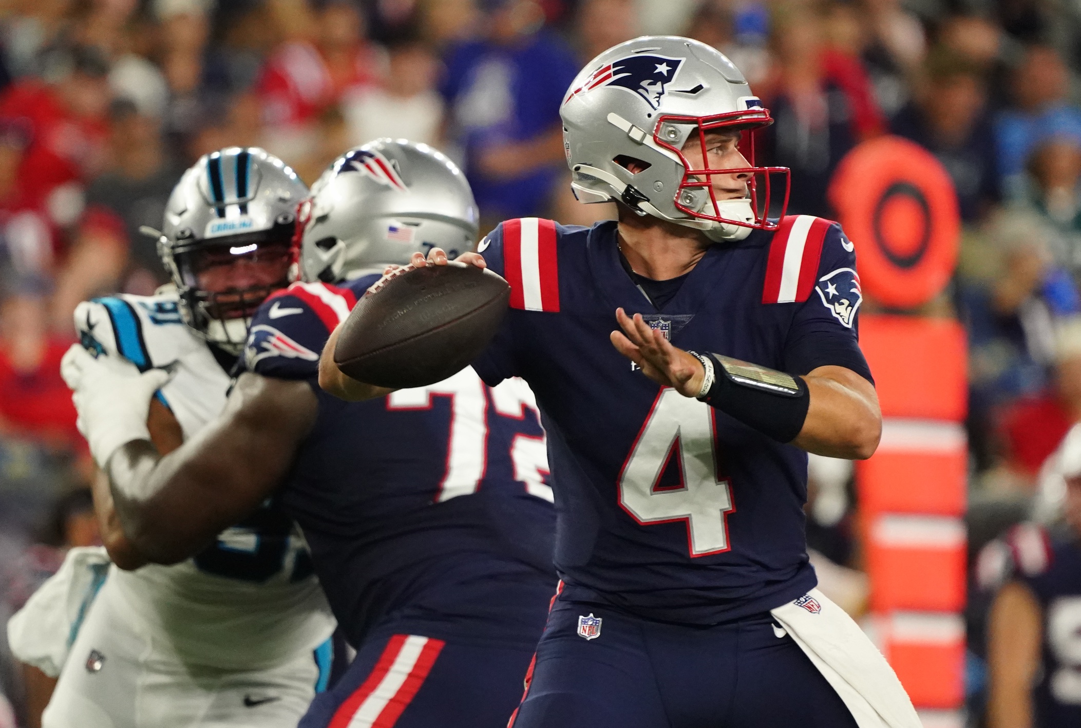 Aug 19, 2022; Foxborough, Massachusetts, USA; New England Patriots quarterback Bailey Zappe (4) throws a pass against the Carolina Panthers in the first half at Gillette Stadium. Mandatory Credit: David Butler II-USA TODAY Sports