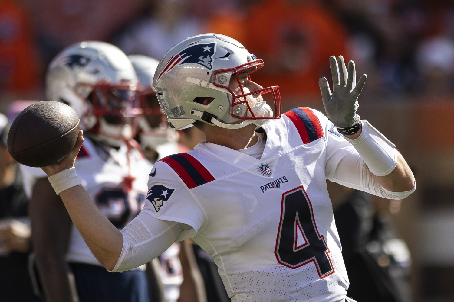 Oct 16, 2022; Cleveland, Ohio, USA; New England Patriots quarterback Bailey Zappe (4) throws the ball during warm up before the game against the Cleveland Browns at FirstEnergy Stadium. Mandatory Credit: Scott Galvin-USA TODAY Sports