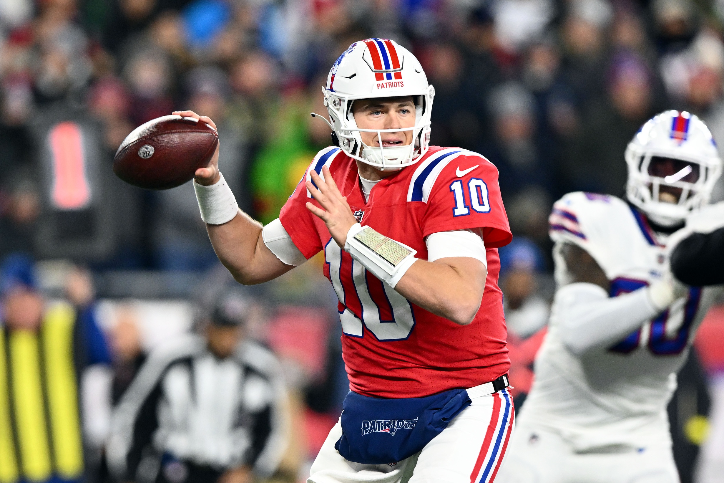 Dec 1, 2022; Foxborough, Massachusetts, USA; New England Patriots quarterback Mac Jones (10) throws the ball against the Buffalo Bills during the first half at Gillette Stadium. Mandatory Credit: Brian Fluharty-USA TODAY Sports