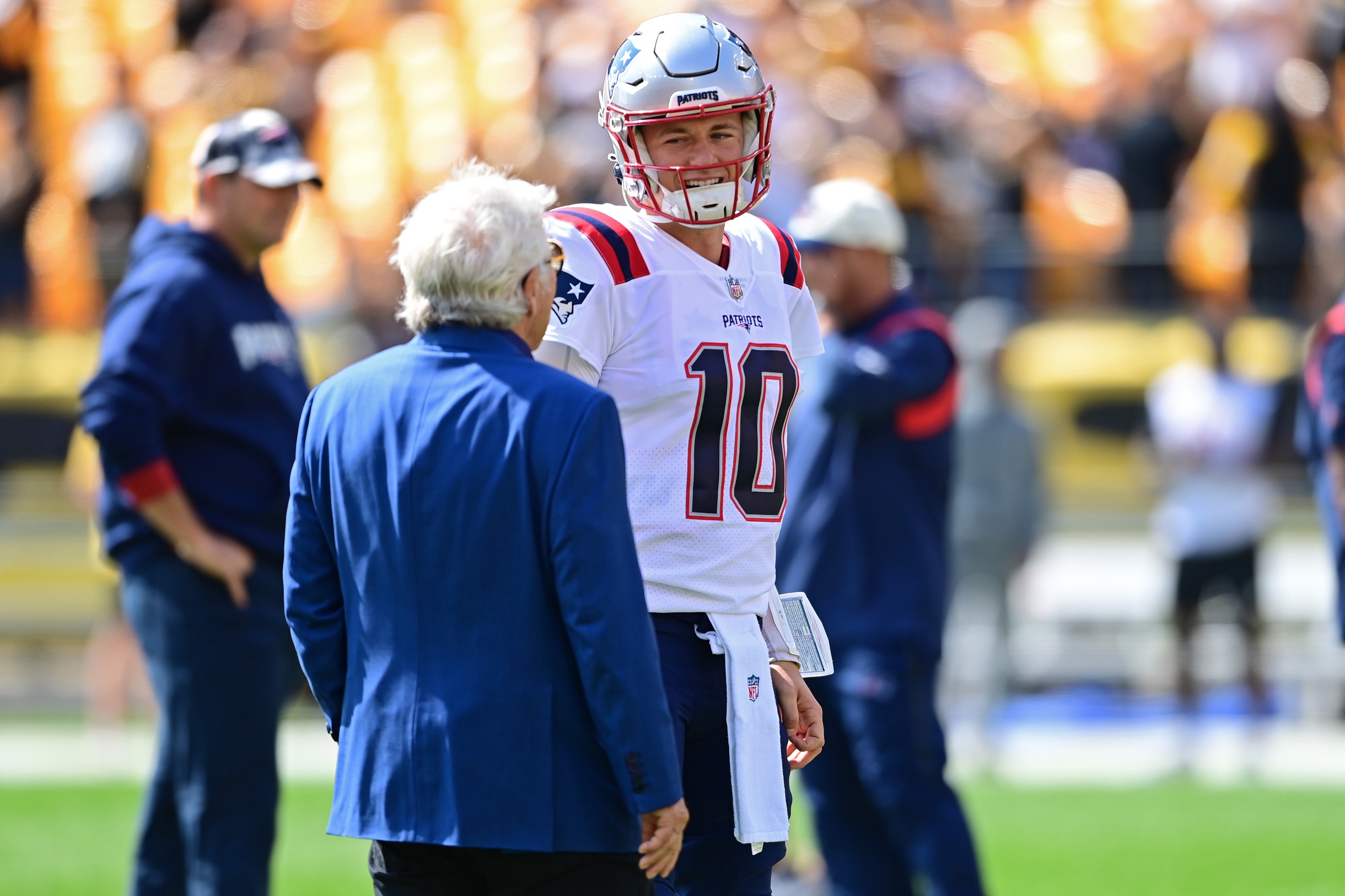 Sep 18, 2022; Pittsburgh, Pennsylvania, USA; New England Patriots owner Robert Kraft talks with New England Patriots quarterback Mac Jones (10) before the game against the Pittsburgh Steelers at Acrisure Stadium. Mandatory Credit: David Dermer-USA TODAY Sports