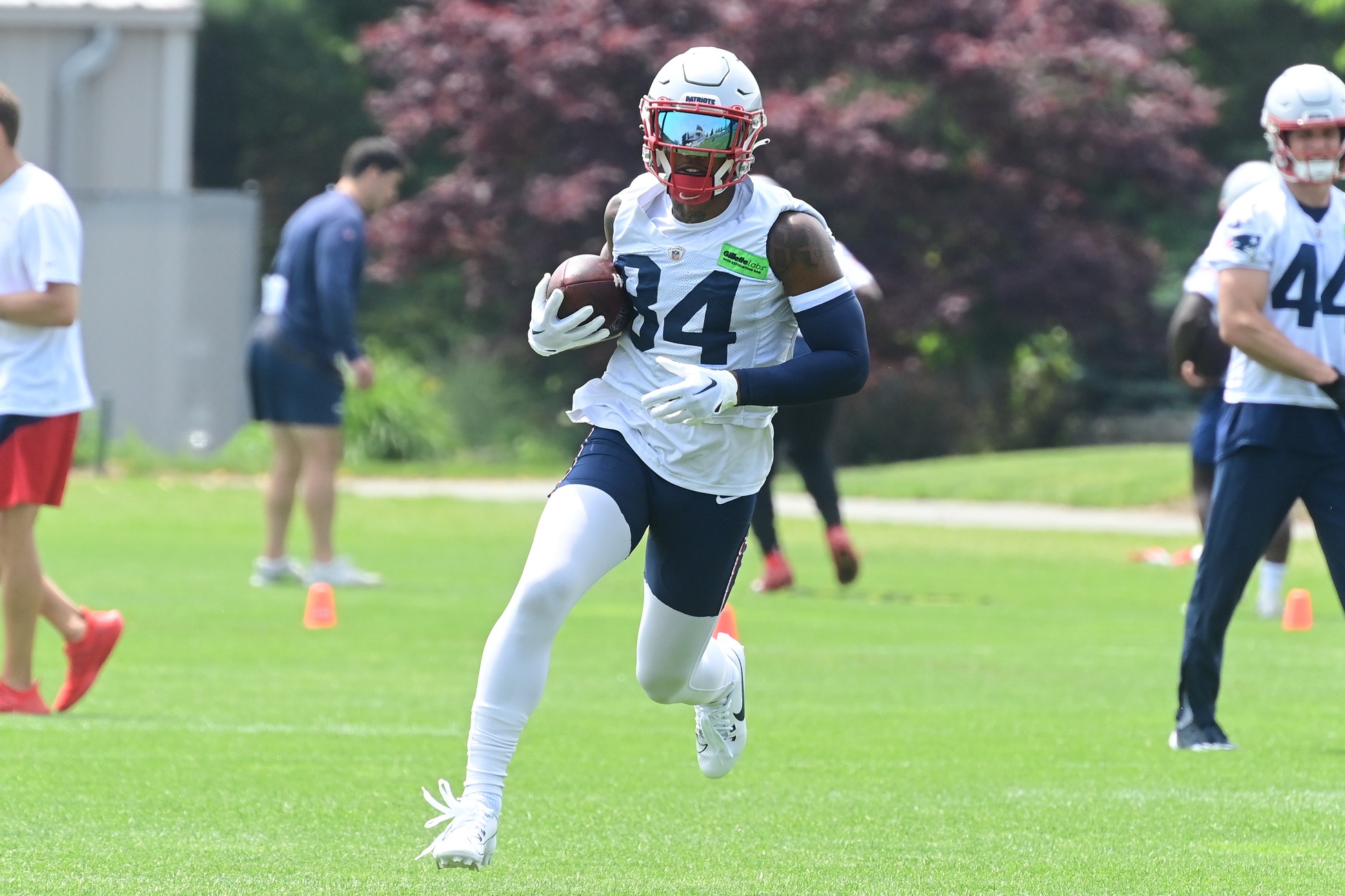 Jun 12, 2023; Foxborough, MA, USA; New England Patriots wide receiver Kendrick Bourne (84) runs after making a catch at the Patriots minicamp at Gillette Stadium.  Mandatory Credit: Eric Canha-USA TODAY Sports