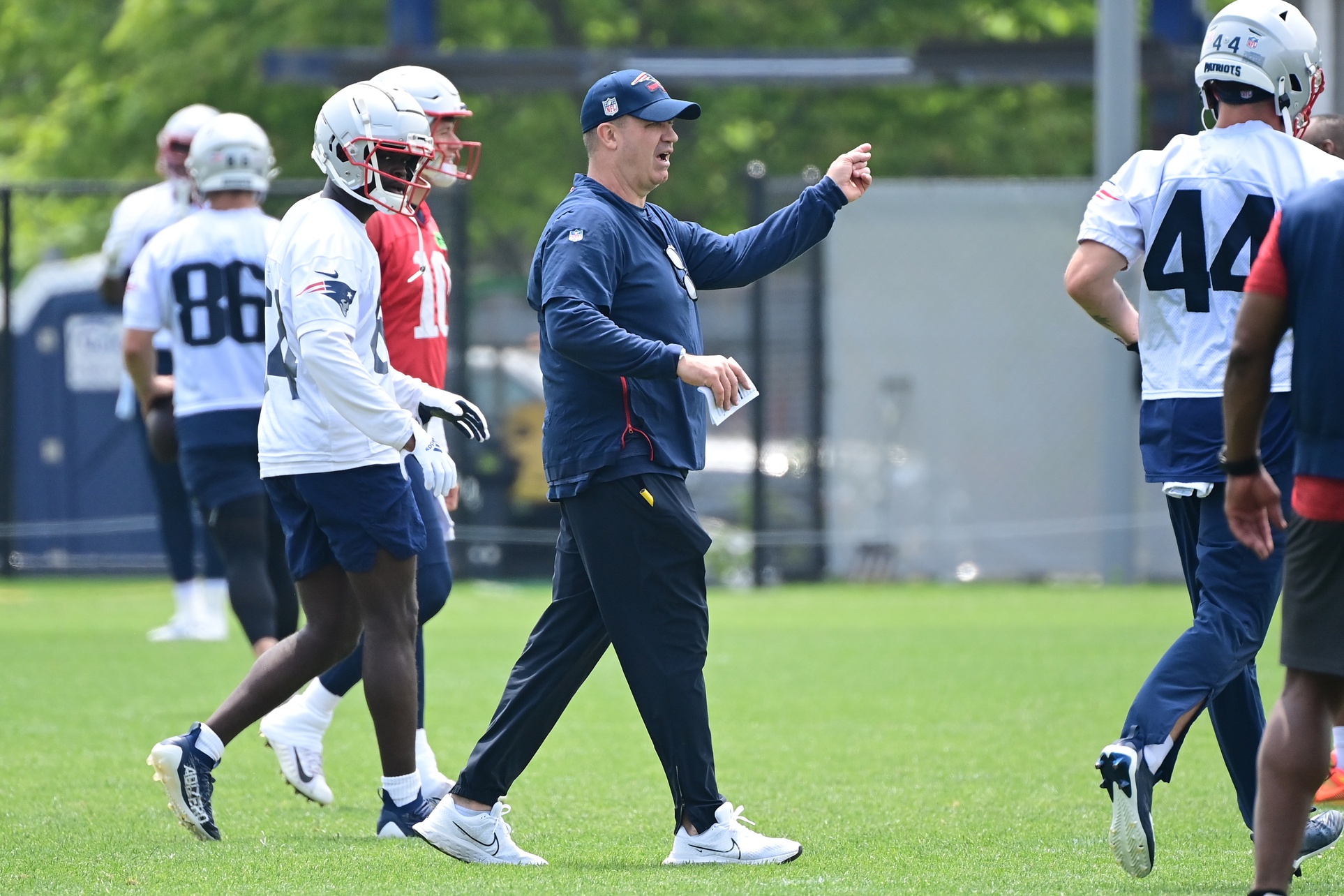 Jun 12, 2023; Foxborough, MA, USA; New England Patriots offensive coordinator / quarterbacks coach Bill O'Brien works with the team at the Patriots minicamp at Gillette Stadium.  Mandatory Credit: Eric Canha-USA TODAY Sports