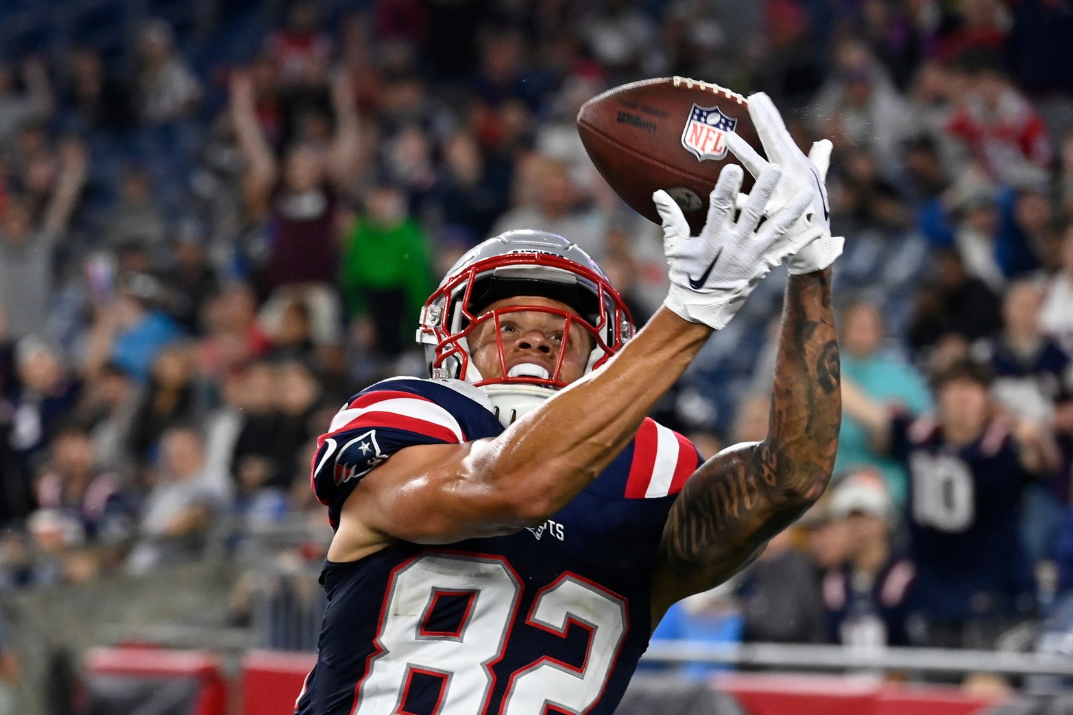 Aug 10, 2023; Foxborough, Massachusetts, USA; New England Patriots wide receiver Tre Nixon (82) drops a pass in the endzone  during the second half against the Houston Texans at Gillette Stadium. Mandatory Credit: Eric Canha-USA TODAY Sports