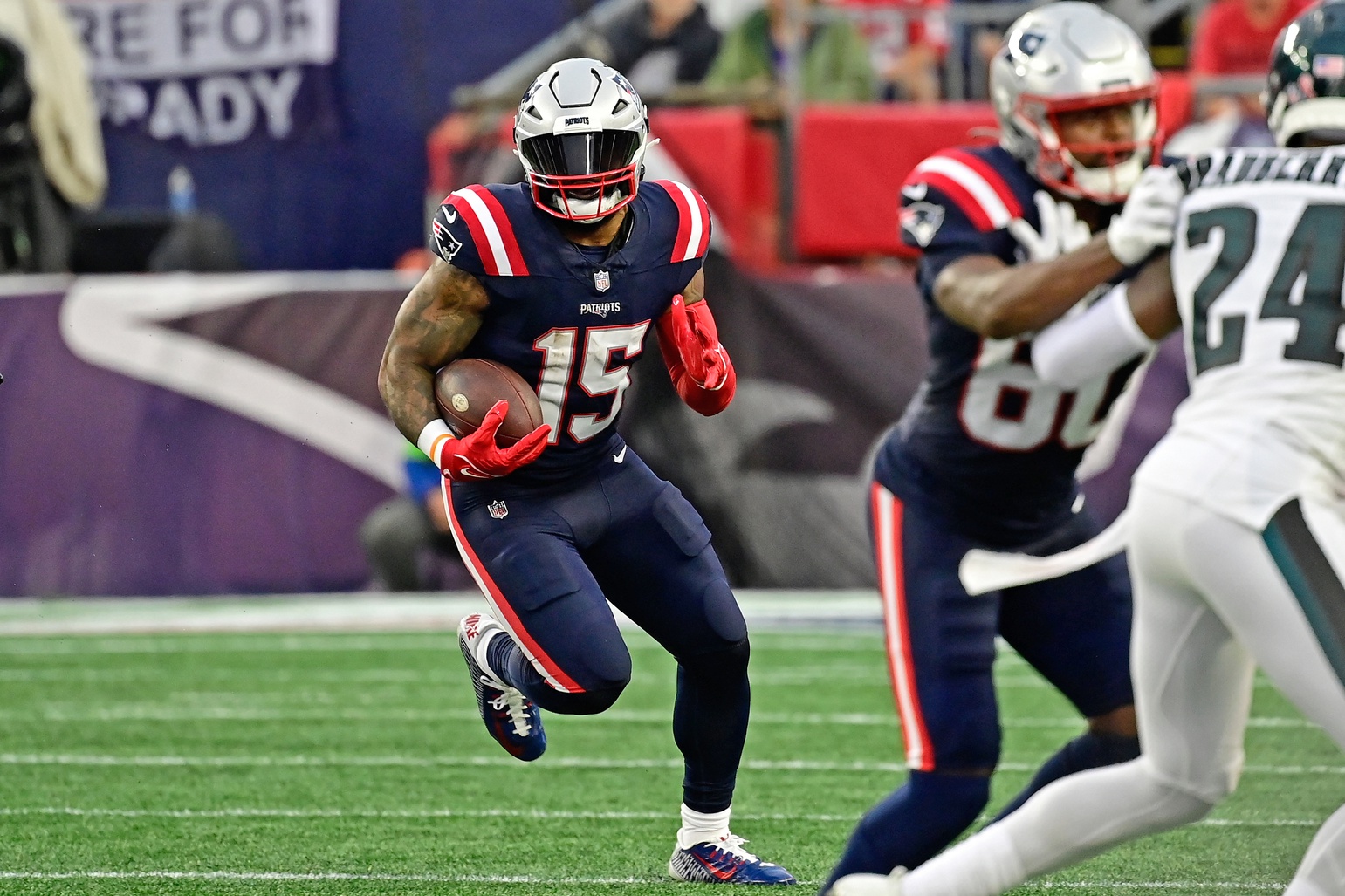 Sep 10, 2023; Foxborough, Massachusetts, USA; New England Patriots running back Ezekiel Elliott (15) runs the ball against the Philadelphia Eagles during the second half at Gillette Stadium. Mandatory Credit: Eric Canha-USA TODAY Sports