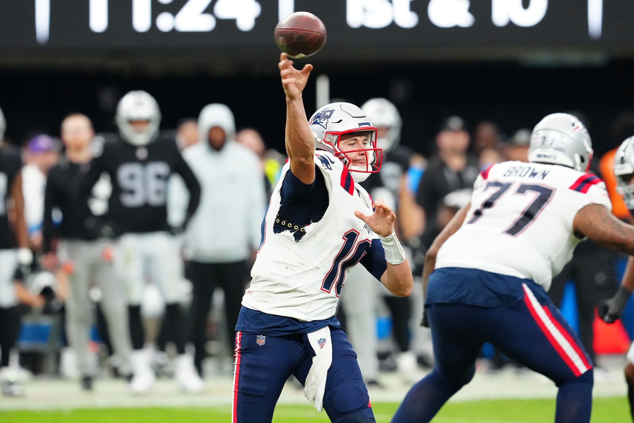 Oct 15, 2023; Paradise, Nevada, USA; New England Patriots quarterback Mac Jones (10) makes a pass attempt against the Las Vegas Raiders during the fourth quarter at Allegiant Stadium. Mandatory Credit: Stephen R. Sylvanie-USA TODAY Sports