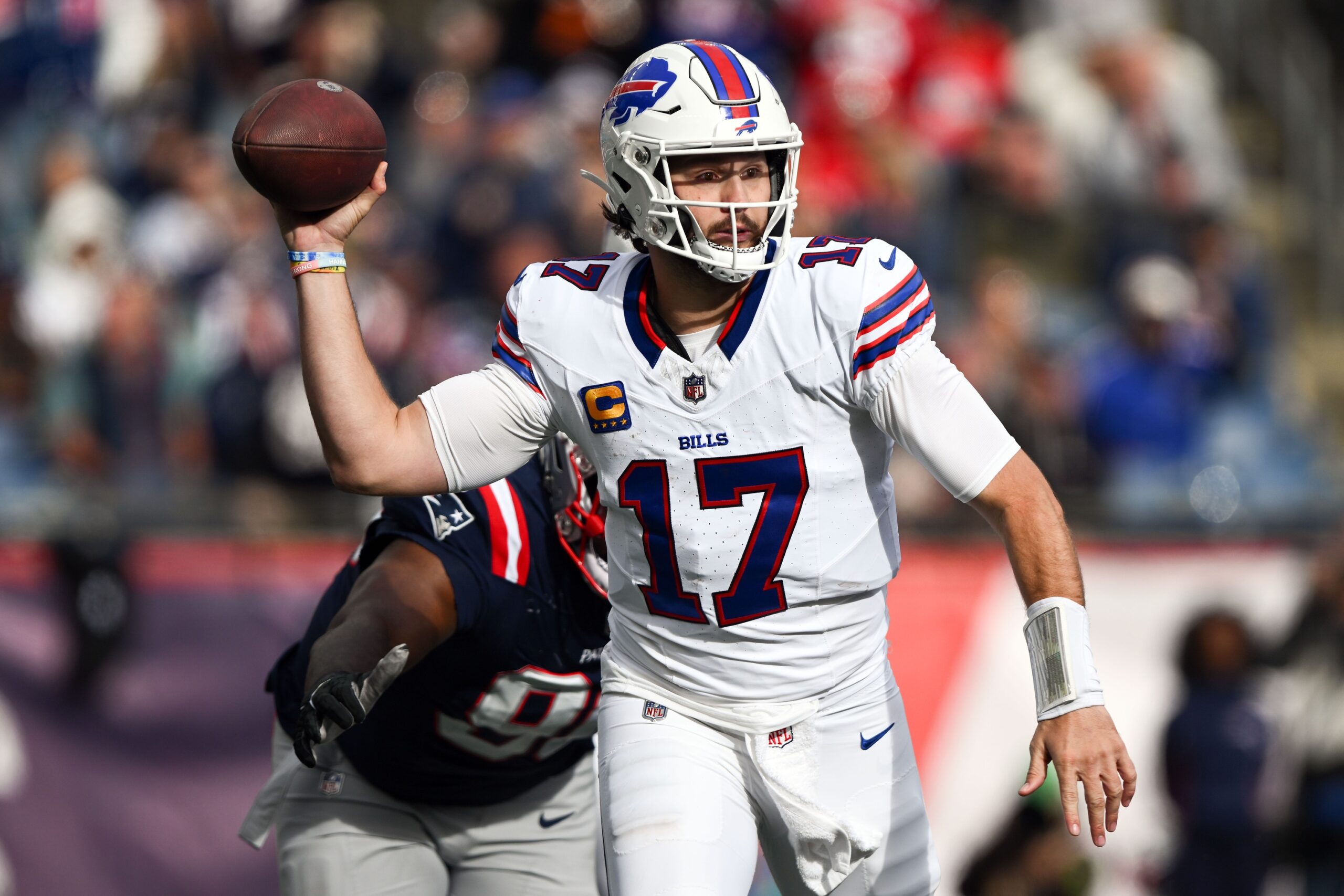 Oct 22, 2023; Foxborough, Massachusetts, USA; Buffalo Bills quarterback Josh Allen (17) throws the ball against the New England Patriots during the second half at Gillette Stadium. Mandatory Credit: Brian Fluharty-USA TODAY Sports