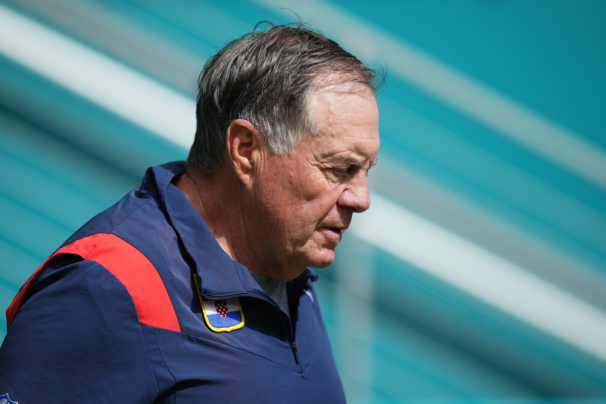Oct 29, 2023; Miami Gardens, Florida, USA; New England Patriots head coach Bill Belichick walks onto the field prior to the game against the Miami Dolphins at Hard Rock Stadium. Mandatory Credit: Jasen Vinlove-USA TODAY Sports