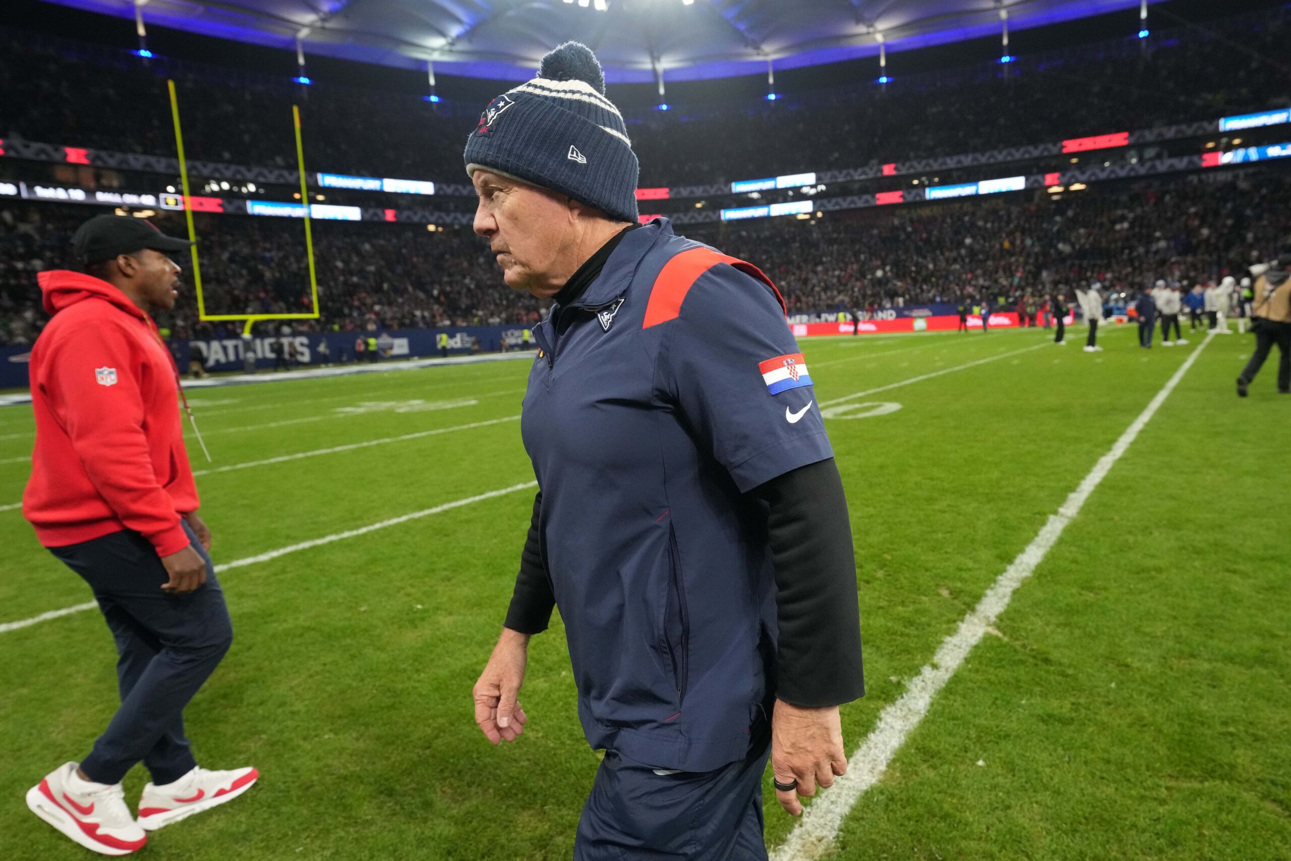 Nov 12, 2023; Frankfurt, Germany; New England Patriots coach Bill Belichick leaves the field after an NFL International Series game against the Indianapolis Colts at Deutsche Bank Park. Mandatory Credit: Kirby Lee-USA TODAY Sports