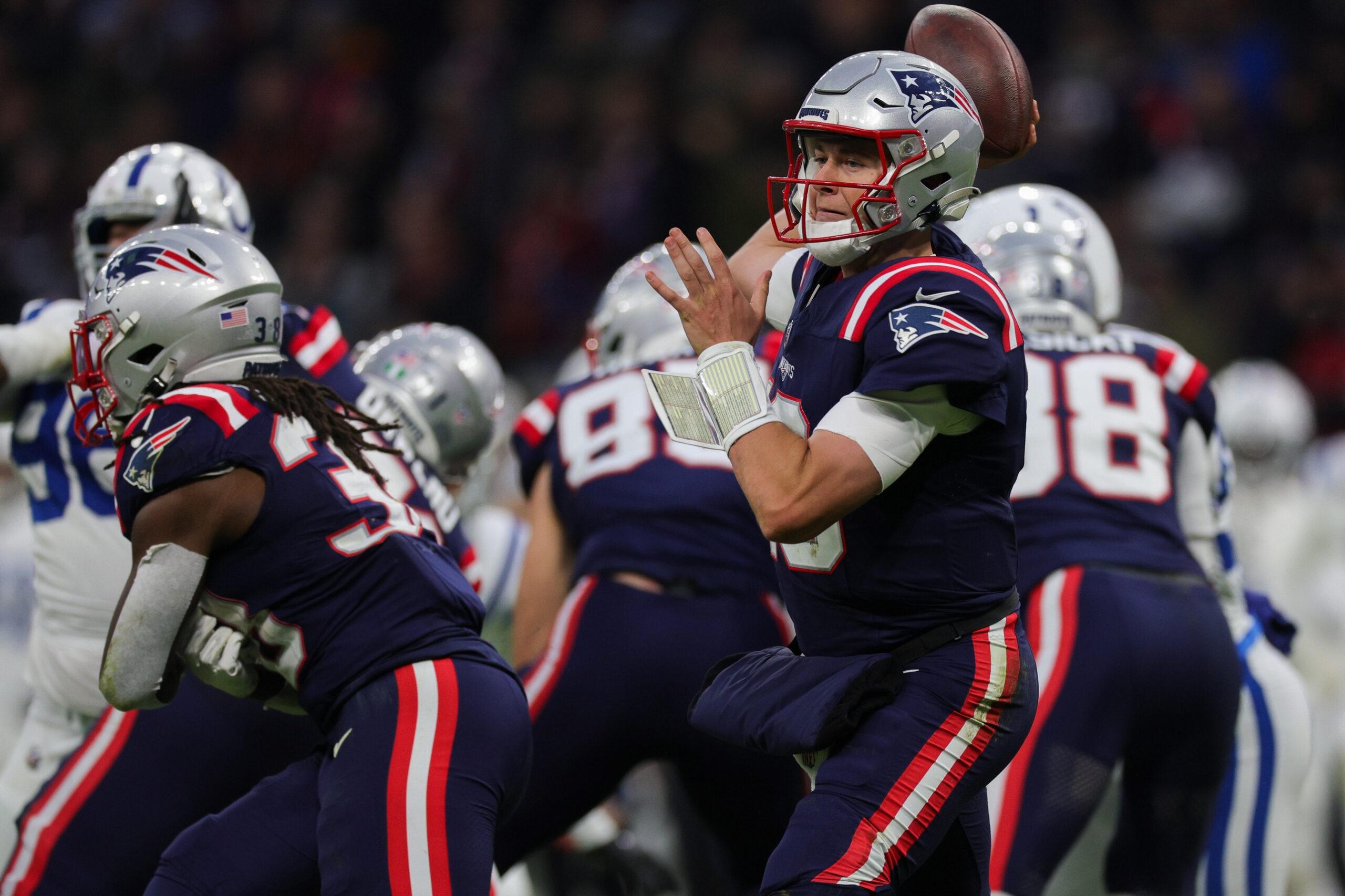 Nov 12, 2023; Frankfurt, Germany;  New England Patriots quarterback Mac Jones (10) drops back two pass against the Indianapolis Colts in the second quarter during an International Series game at Deutsche Bank Park. Mandatory Credit: Nathan Ray Seebeck-USA TODAY Sports