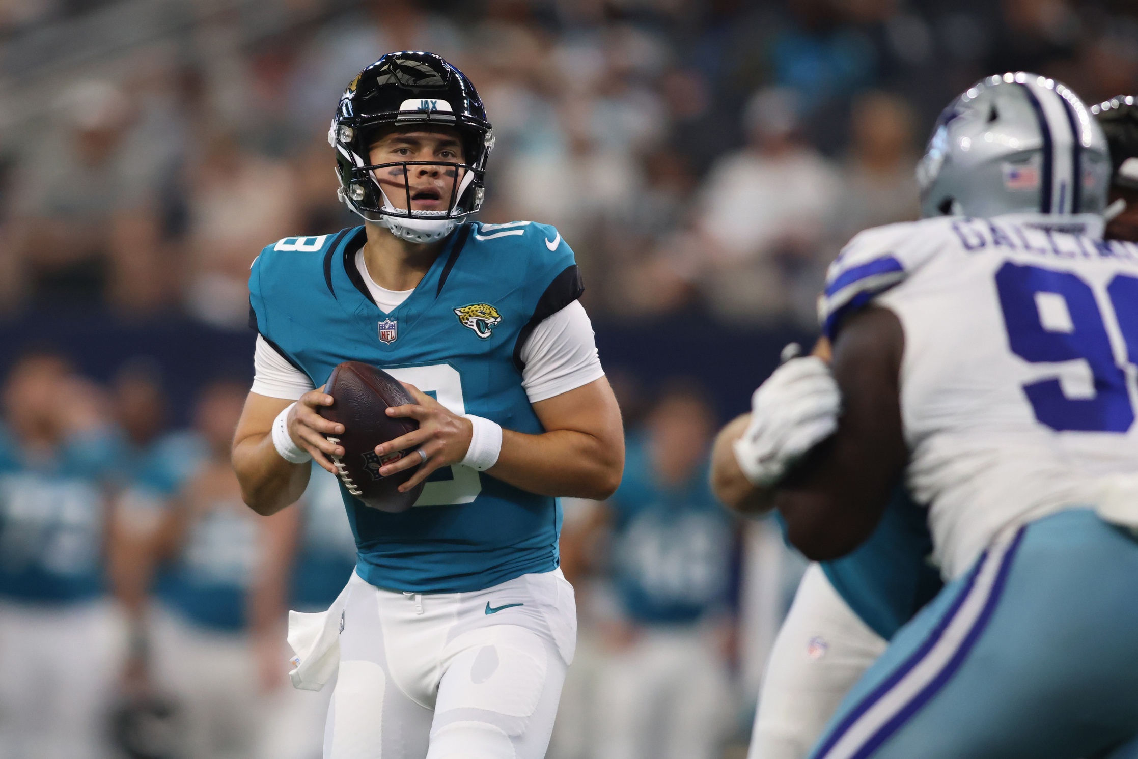 Aug 12, 2023; Arlington, Texas, USA; Jacksonville Jaguars quarterback Nathan Rourke (18) against the Dallas Cowboys at AT&T Stadium. Mandatory Credit: Tim Heitman-USA TODAY Sports