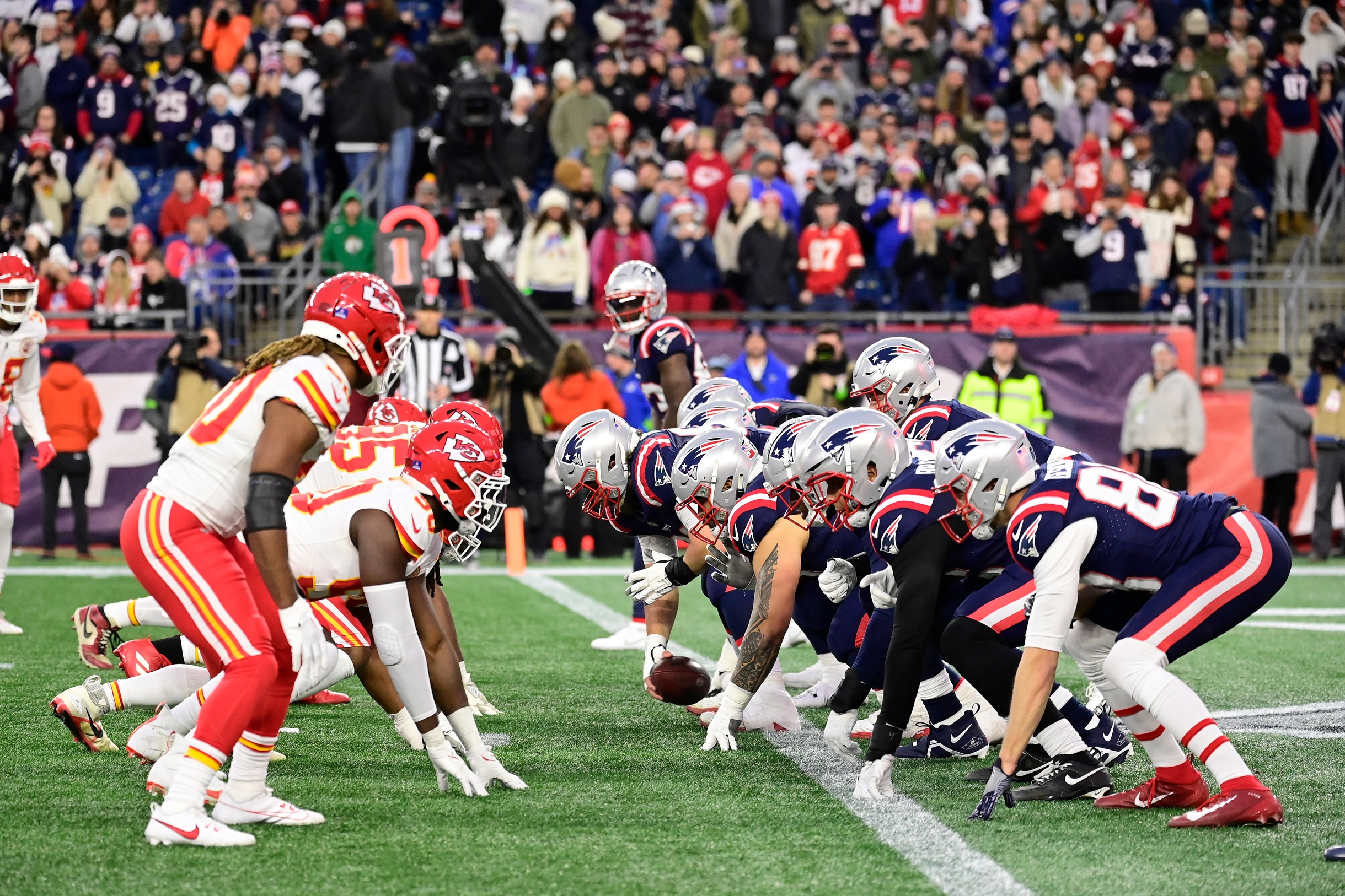 Dec 17, 2023; Foxborough, Massachusetts, USA; The New England Patriots offensive line and Kansas City Chiefs defense battle over the line of scrimmage during the second half at Gillette Stadium. Mandatory Credit: Eric Canha-USA TODAY Sports