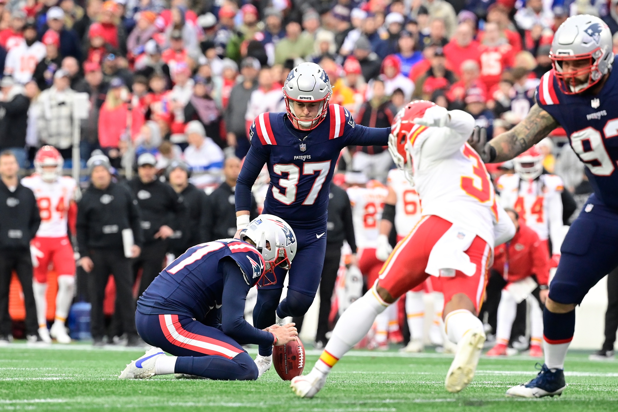 Dec 17, 2023; Foxborough, Massachusetts, USA; New England Patriots place kicker Chad Ryland (37) tries for a field goal during the first half against the Kansas City Chiefs at Gillette Stadium. Mandatory Credit: Eric Canha-USA TODAY Sports