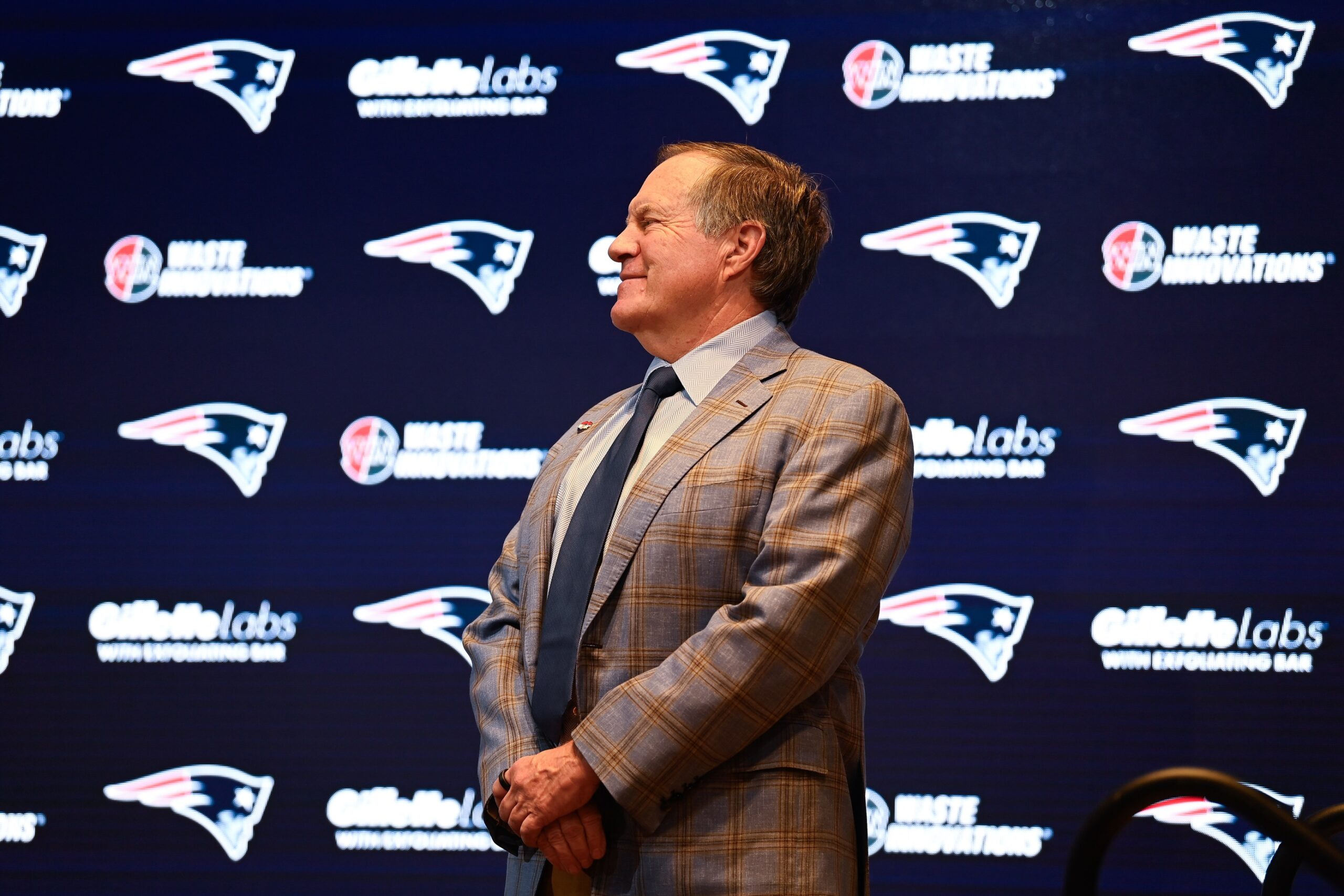 Jan 11, 2024; Foxborough, MA, USA; New England Patriots former head coach Bill Belichick looks on duringa press conference at Gillette Stadium to announce Belichick's exit from the team. Mandatory Credit: Eric Canha-USA TODAY Sports
