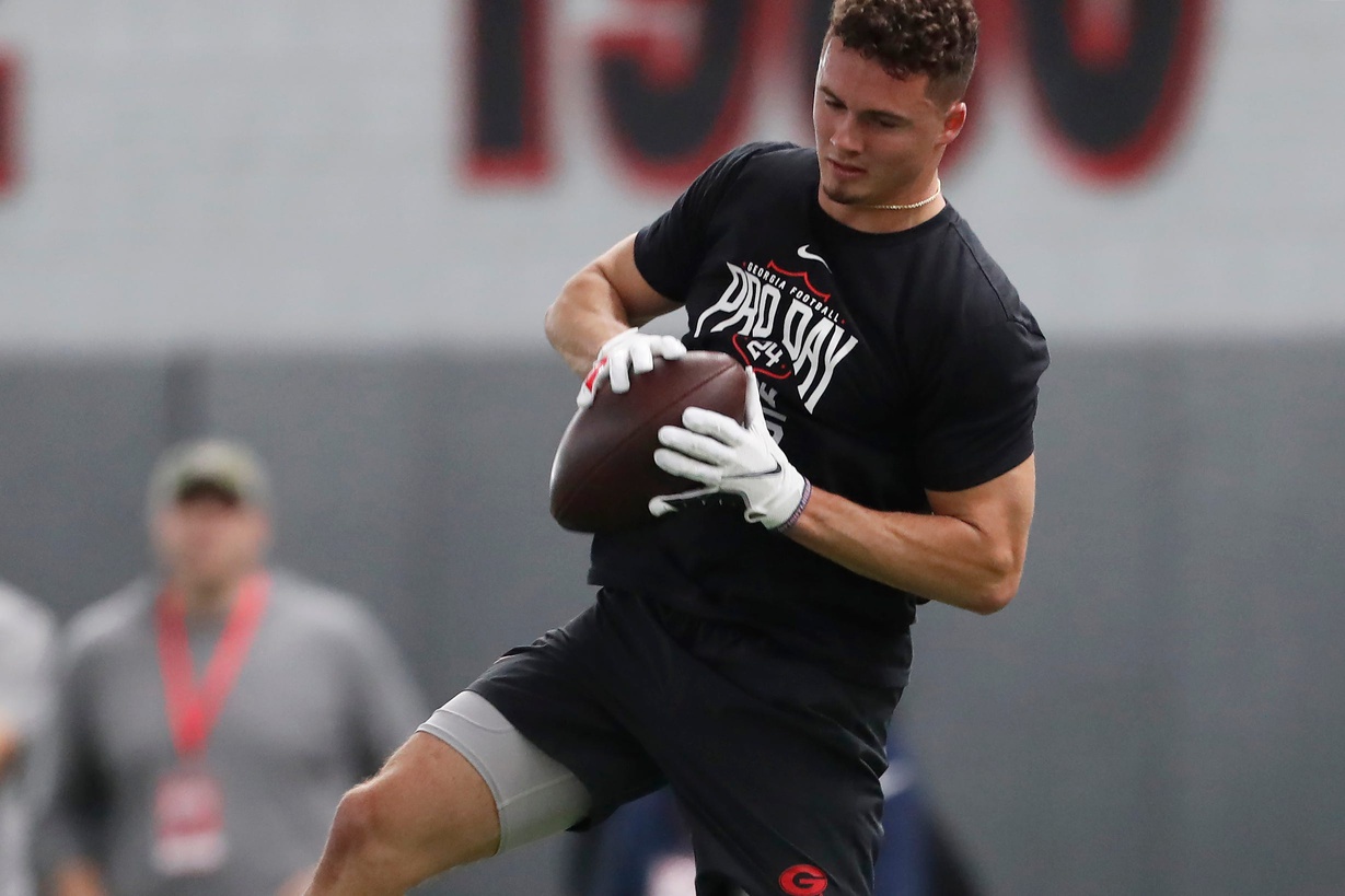 Georgia wide receiver Ladd McConkey (84) goes up to make a catch during Georgia football's Pro Day in Athens, Ga., on Wednesday, March 13, 2024.