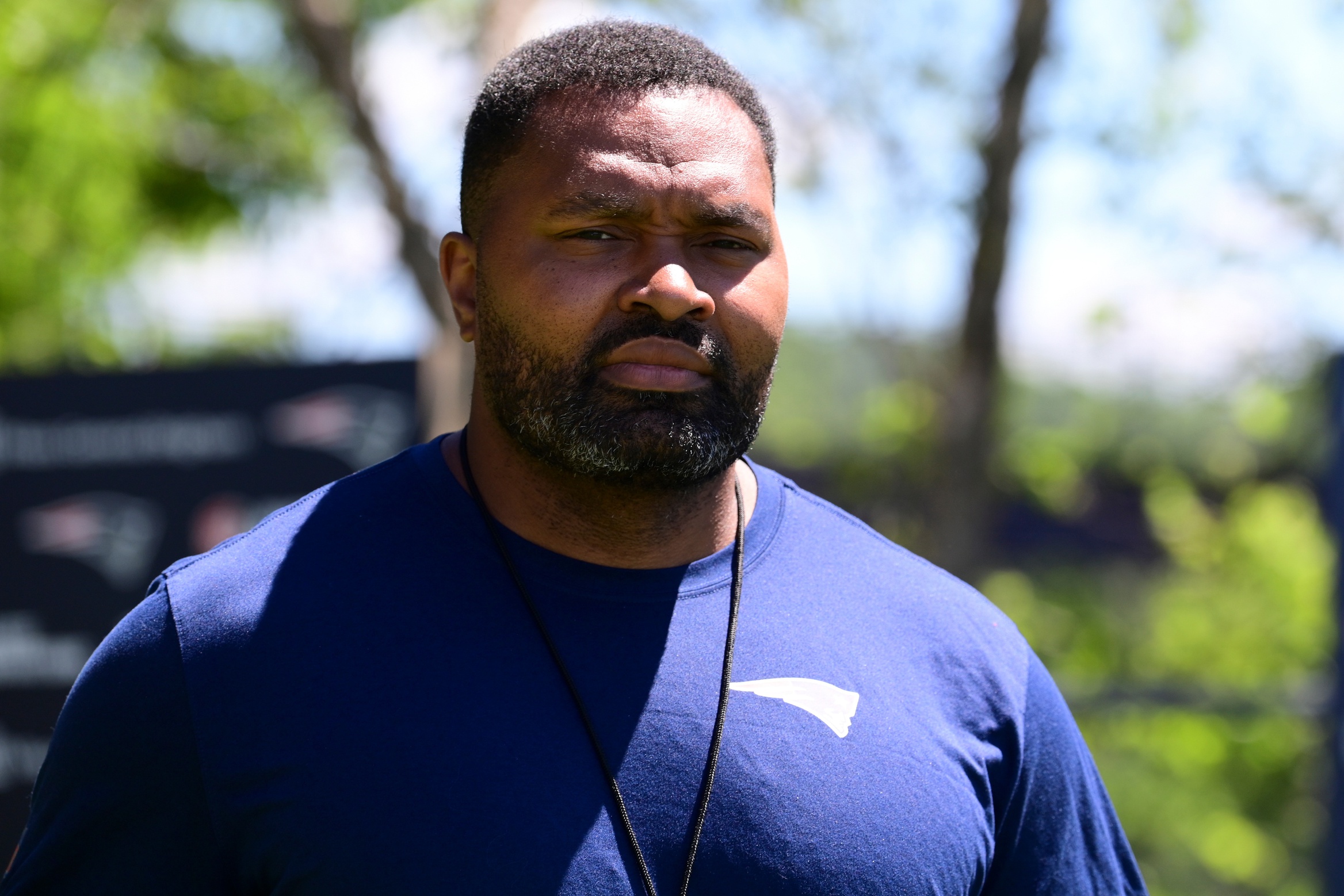 Jun 10, 2024; Foxborough, MA, USA;  New England Patriots head coach Jerod Mayo  walks to a press conference before minicamp at Gillette Stadium. Mandatory Credit: Eric Canha-USA TODAY Sports