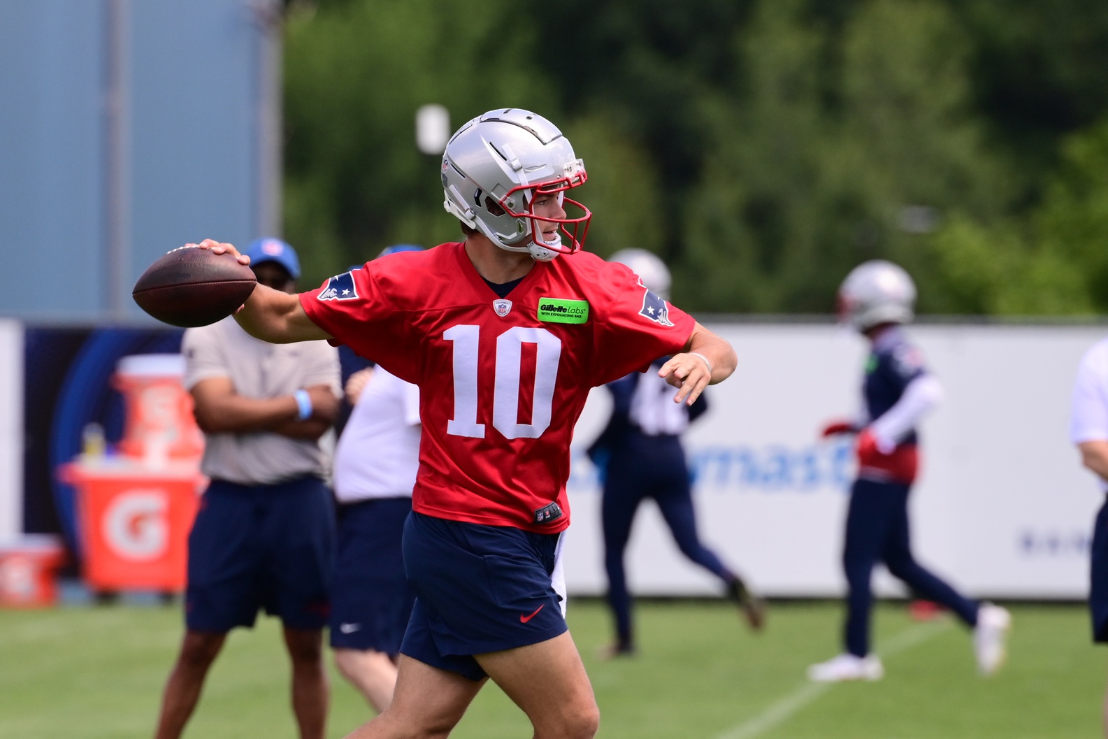 Jun 10, 2024; Foxborough, MA, USA;  New England Patriots quarterback Drake Maye (10) throws a pass at minicamp at Gillette Stadium. Mandatory Credit: Eric Canha-USA TODAY Sports