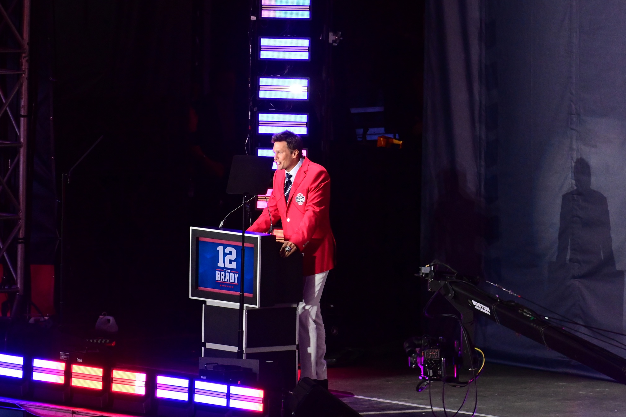 Jun 12, 2024; Foxborough, MA, USA; Former quarterback Tom Brady speaks during his New England Patriots Hall of Fame induction ceremony at Gillette Stadium.  Mandatory Credit: Eric Canha-USA TODAY Sports