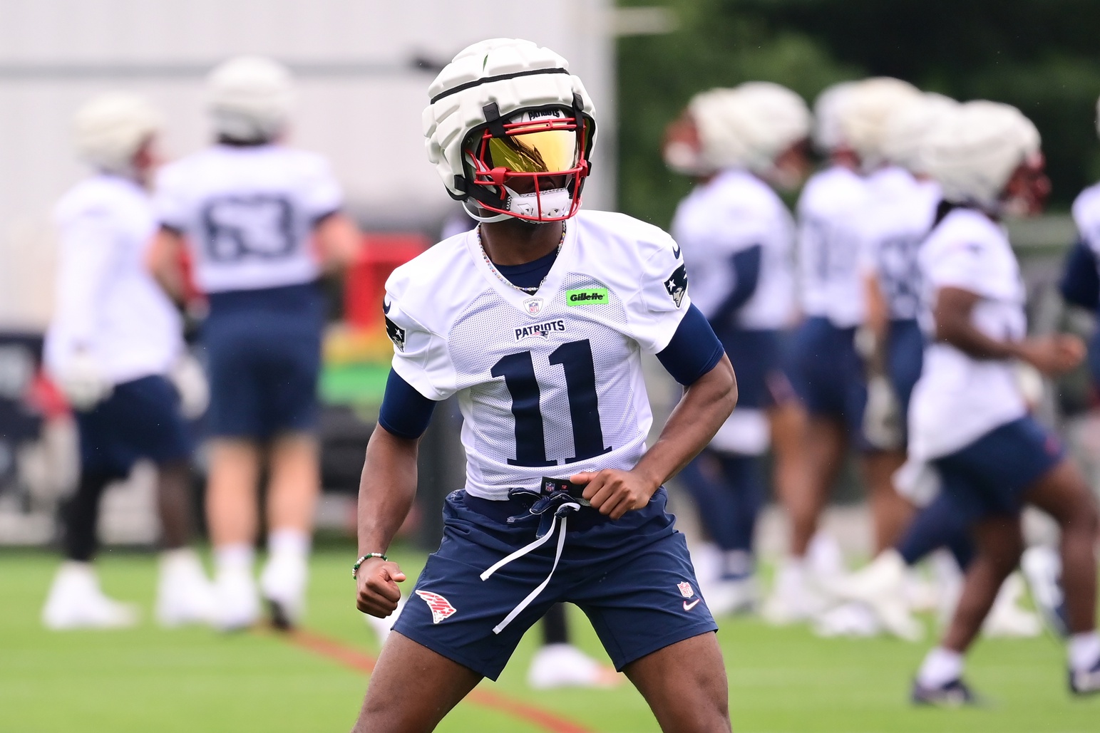 Jul 24, 2024; Foxborough, MA, USA; New England Patriots wide receiver Tyquan Thornton (11) stretches during training camp at Gillette Stadium. Mandatory Credit: Eric Canha-USA TODAY Sports