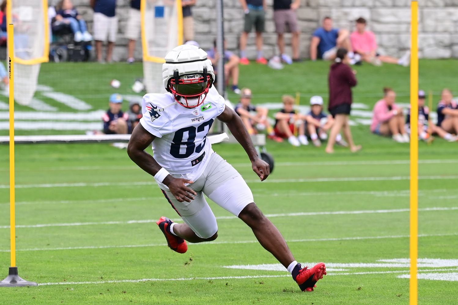 Jul 24, 2024; Foxborough, MA, USA; New England Patriots wide receiver Jalen Reagor (83) runs through a drill during training camp at Gillette Stadium. Mandatory Credit: Eric Canha-USA TODAY Sports