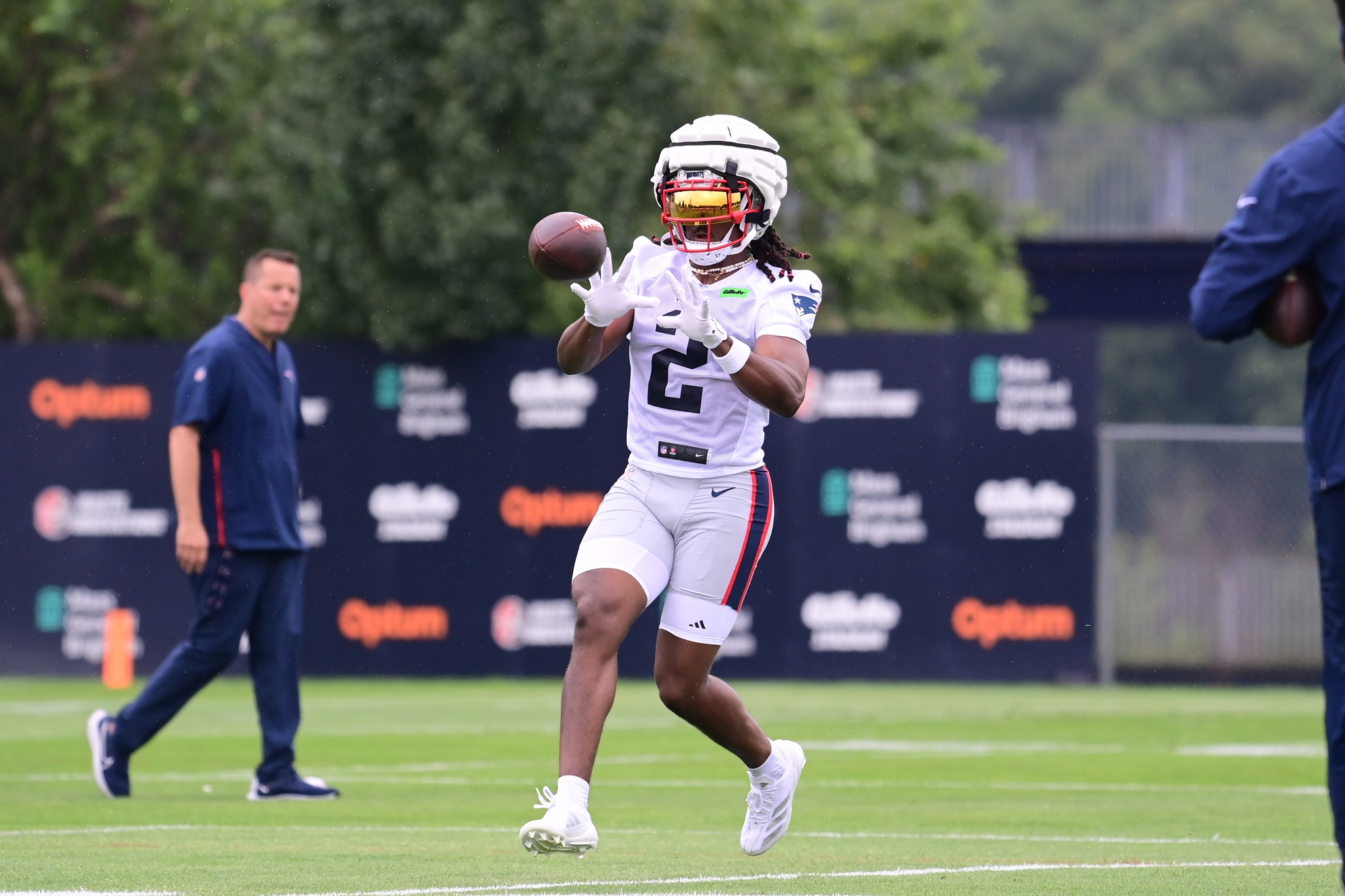 Jul 24, 2024; Foxborough, MA, USA; New England Patriots wide receiver K.J. Osborn (2) makes a catch during training camp at Gillette Stadium. Mandatory Credit: Eric Canha-USA TODAY Sports