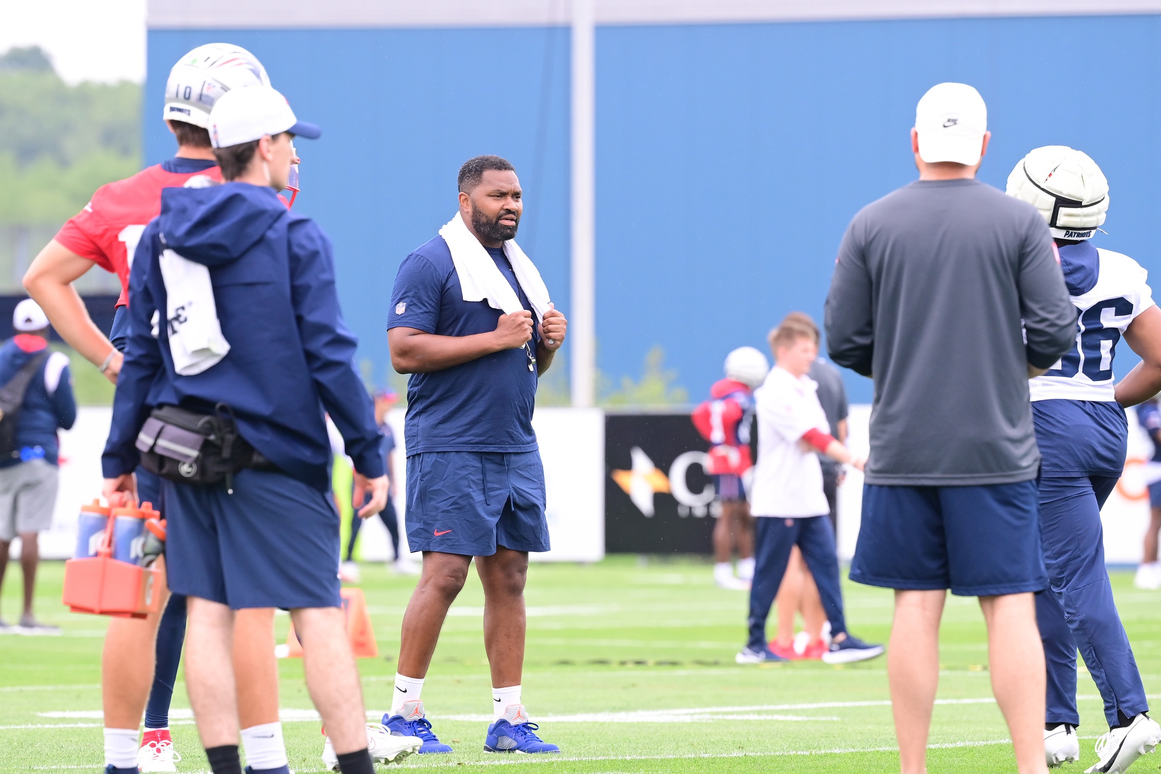 Jul 24, 2024; Foxborough, MA, USA;  New England Patriots head coach Jerod Mayo watches over practice during training camp at Gillette Stadium. Mandatory Credit: Eric Canha-USA TODAY Sports