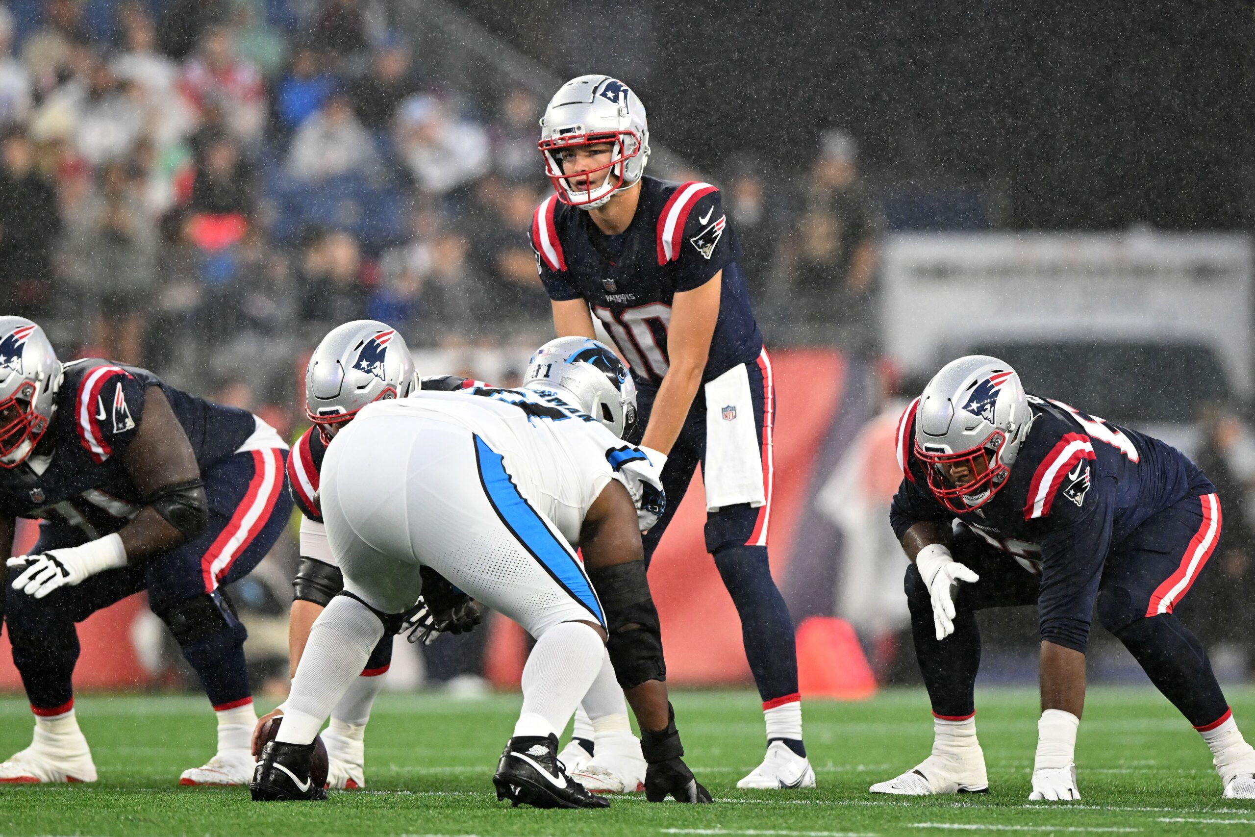 Aug 8, 2024; Foxborough, Massachusetts, USA; New England Patriots quarterback Drake Maye (10) lines up against the Carolina Panthers during the first half at Gillette Stadium. Mandatory Credit: Brian Fluharty-USA TODAY Sports