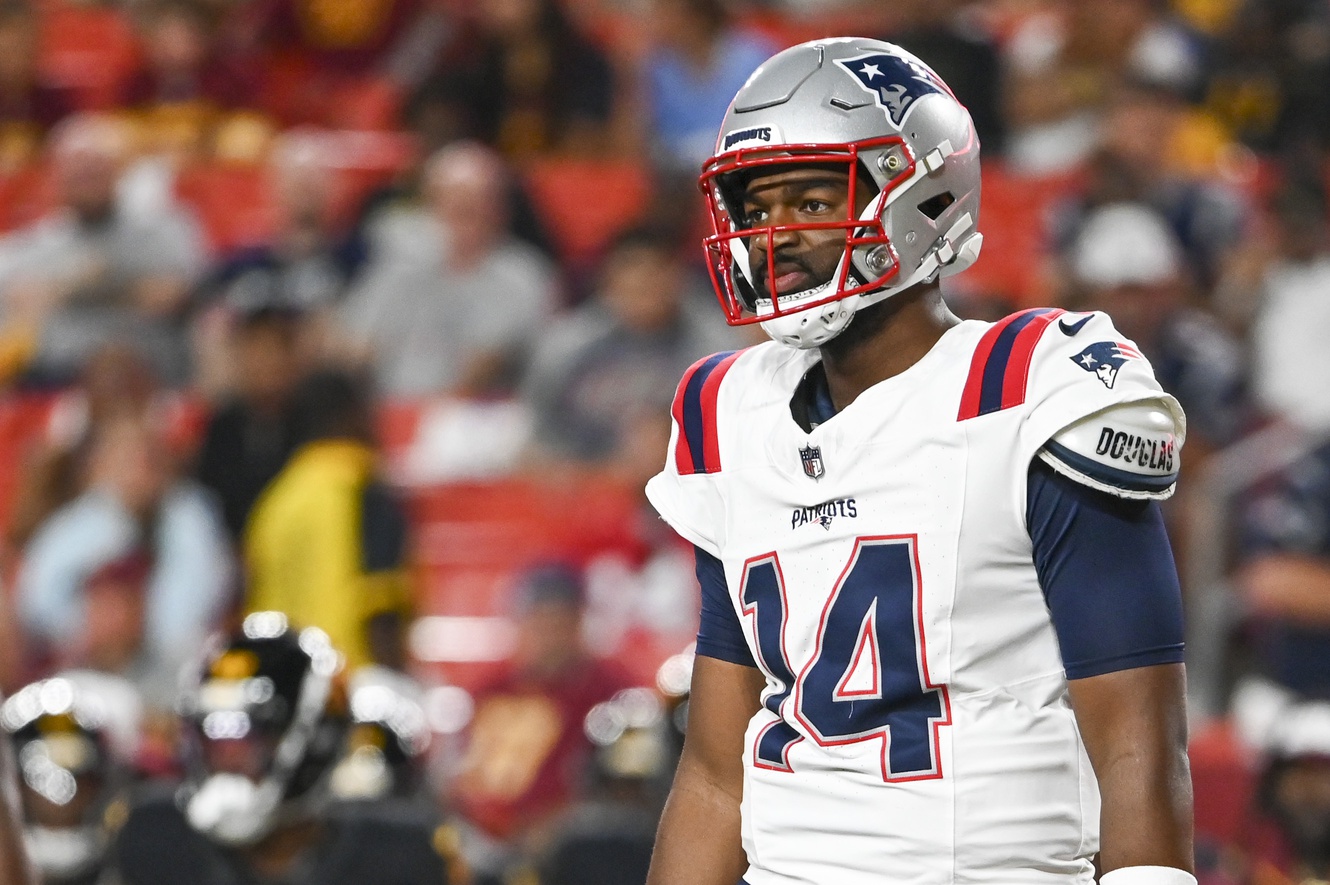 Aug 25, 2024; Landover, Maryland, USA;   New England Patriots quarterback Jacob Brissett (14) looks to the sidelines during the first half against the Washington Commanders at Commanders Field. Mandatory Credit: Tommy Gilligan-USA TODAY Sports