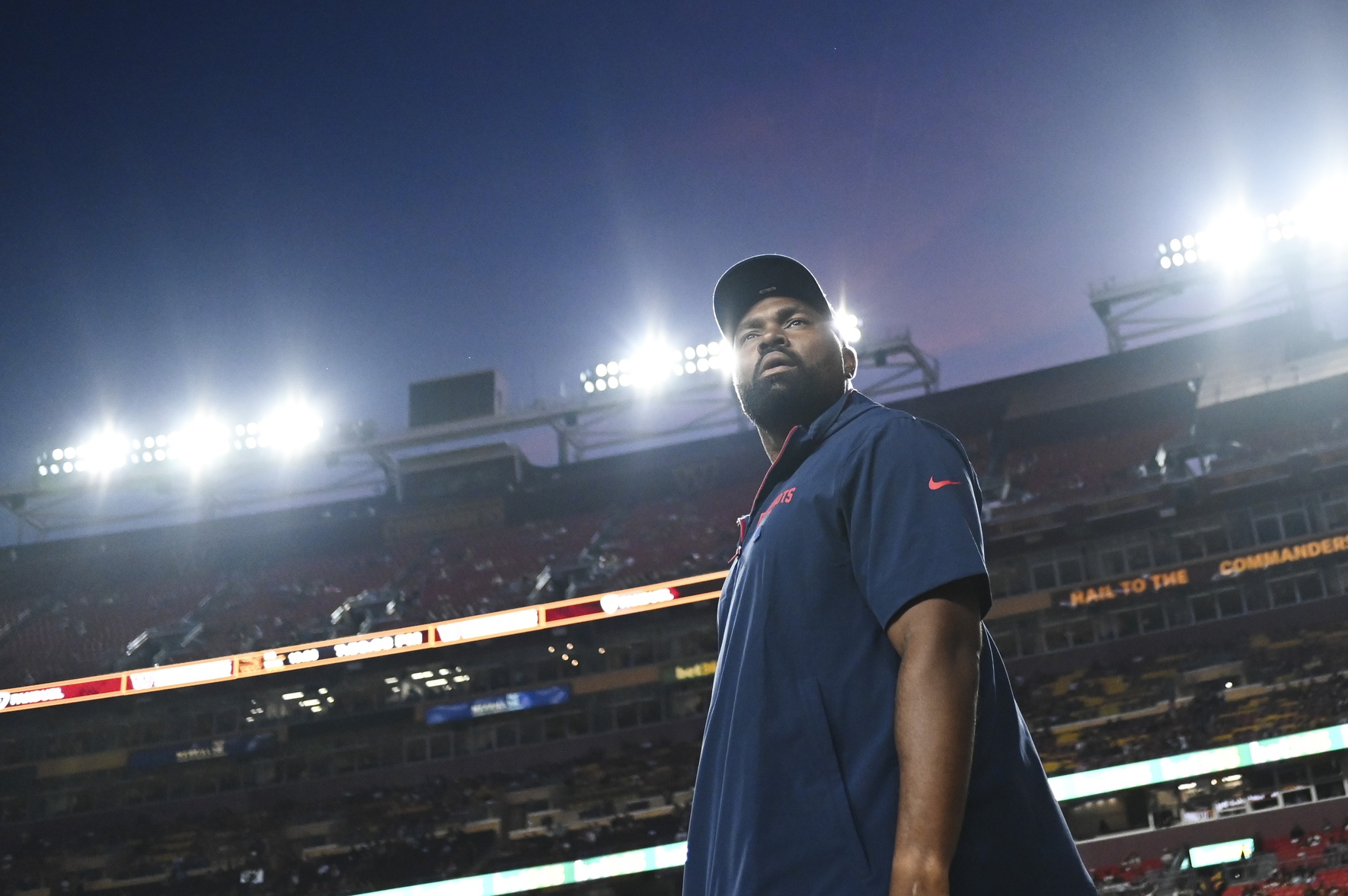 Aug 25, 2024; Landover, Maryland, USA; Washington Commanders head coach Jerod Mayo walks on the field before ether start of the game against the Washington Commanders  at Commanders Field. Mandatory Credit: Tommy Gilligan-USA TODAY Sports
