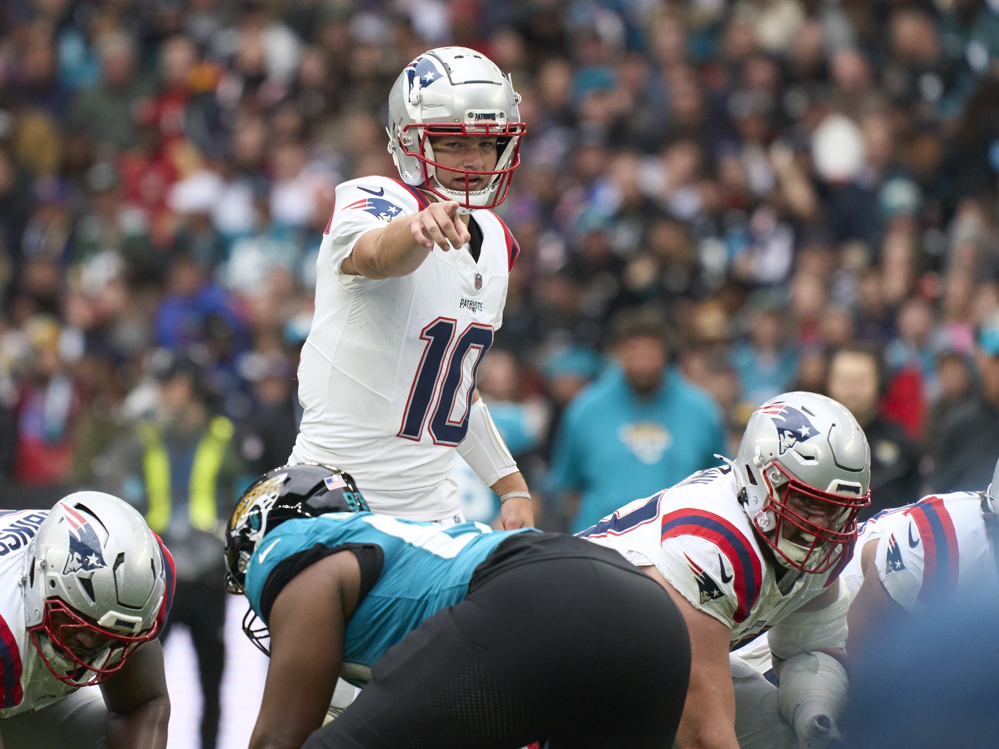 Oct 20, 2024; London, United Kingdom; New England Patriots quarterback Drake Maye (10) in the first half during an NFL International Series game at Wembley Stadium. Mandatory Credit: Peter van den Berg-Imagn Images