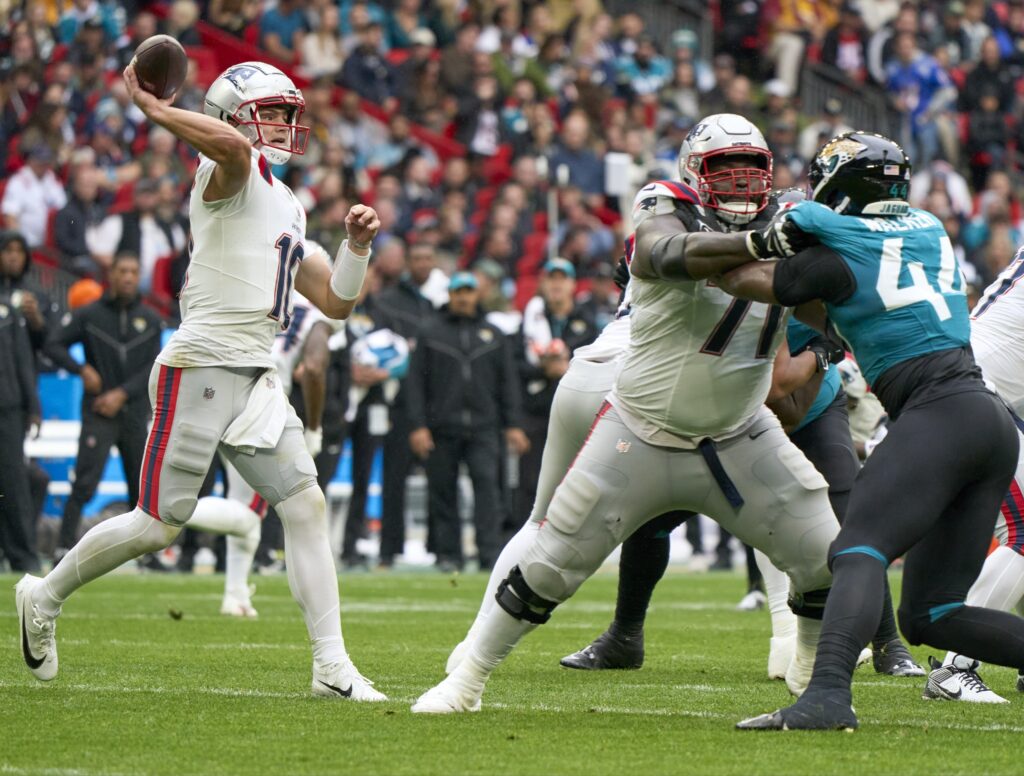 Oct 20, 2024; London, United Kingdom; New England Patriots quarterback Drake Maye (10) throws the ball in the first half during an NFL International Series game at Wembley Stadium. Mandatory Credit: Peter van den Berg-Imagn Images