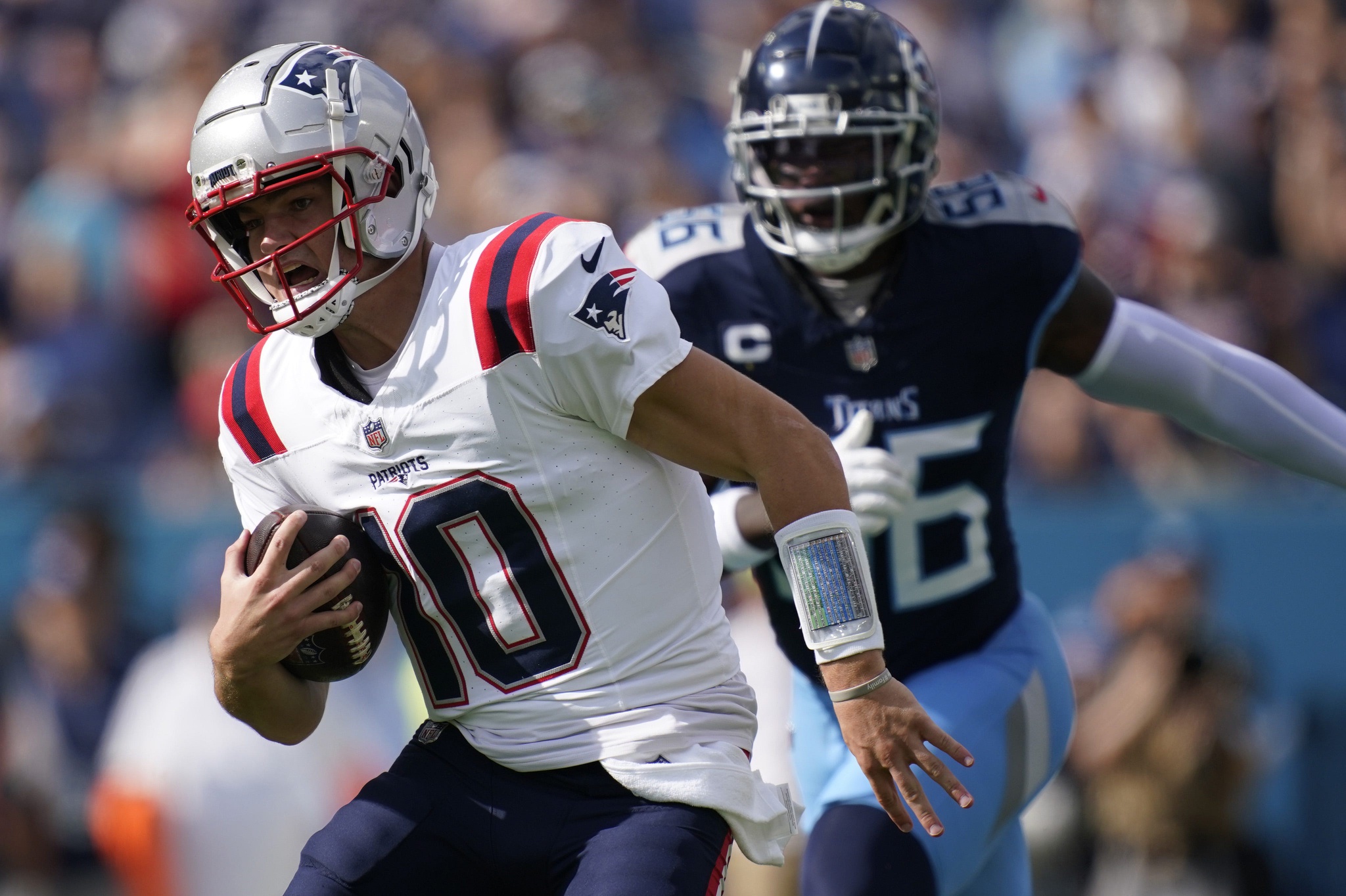 New England quarterback Drake Maye runs the ball on a keeper during the first quarter as the Tennessee Titans take on the New England Patriots at Nissan Stadium in Nashville, Tenn., Sunday, Nov. 3, 2024.