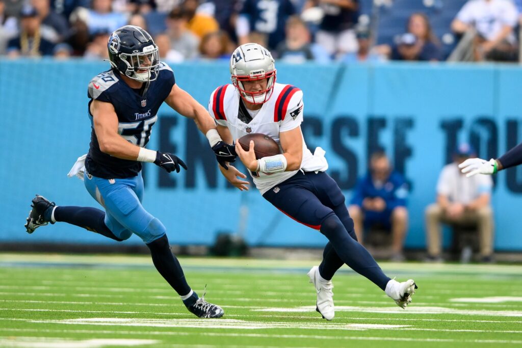 Nov 3, 2024; Nashville, Tennessee, USA; Tennessee Titans linebacker Jack Gibbens (50) chases down New England Patriots quarterback Drake Maye (10) during the second half at Nissan Stadium. Mandatory Credit: Steve Roberts-Imagn Images
