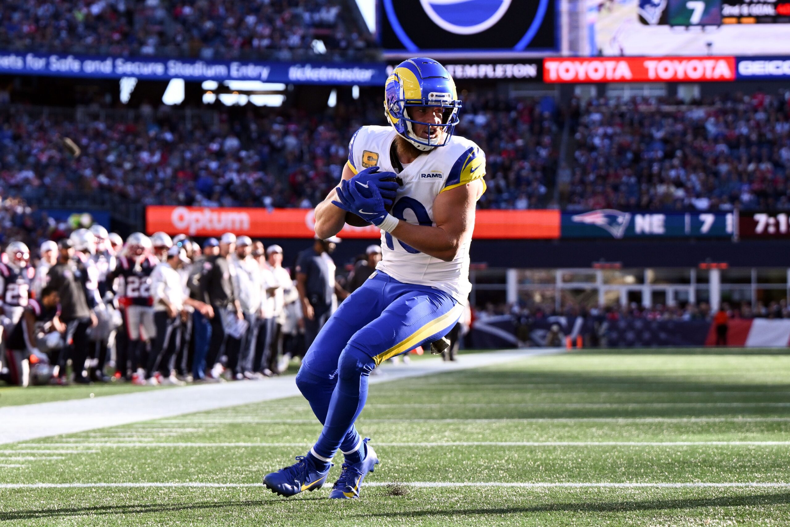 Nov 17, 2024; Foxborough, Massachusetts, USA; Los Angeles Rams wide receiver Cooper Kupp (10) scores a touchdown against the New England Patriots during the first half at Gillette Stadium. Mandatory Credit: Brian Fluharty-Imagn Images