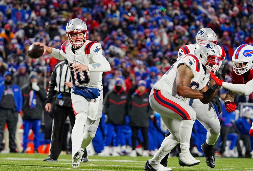 New England Patriots Drake Maye gets ready to throw a pass to a receiver during first half action at Highmark Stadium where the Buffalo Bills hosted the New England Patriots in Orchard Park on Dec. 22, 2024.