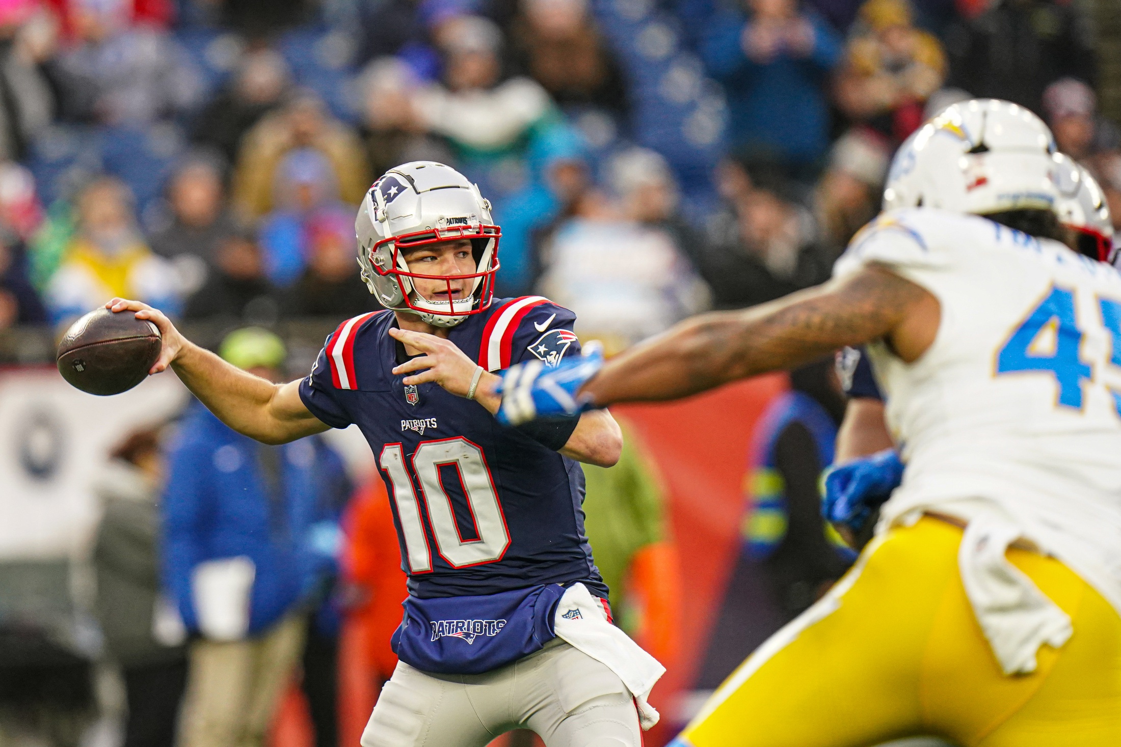 Dec 28, 2024; Foxborough, Massachusetts, USA; New England Patriots quarterback Drake Maye (10) passes the ball against the Los Angeles Chargers in the second half at Gillette Stadium. Mandatory Credit: David Butler II-Imagn Images